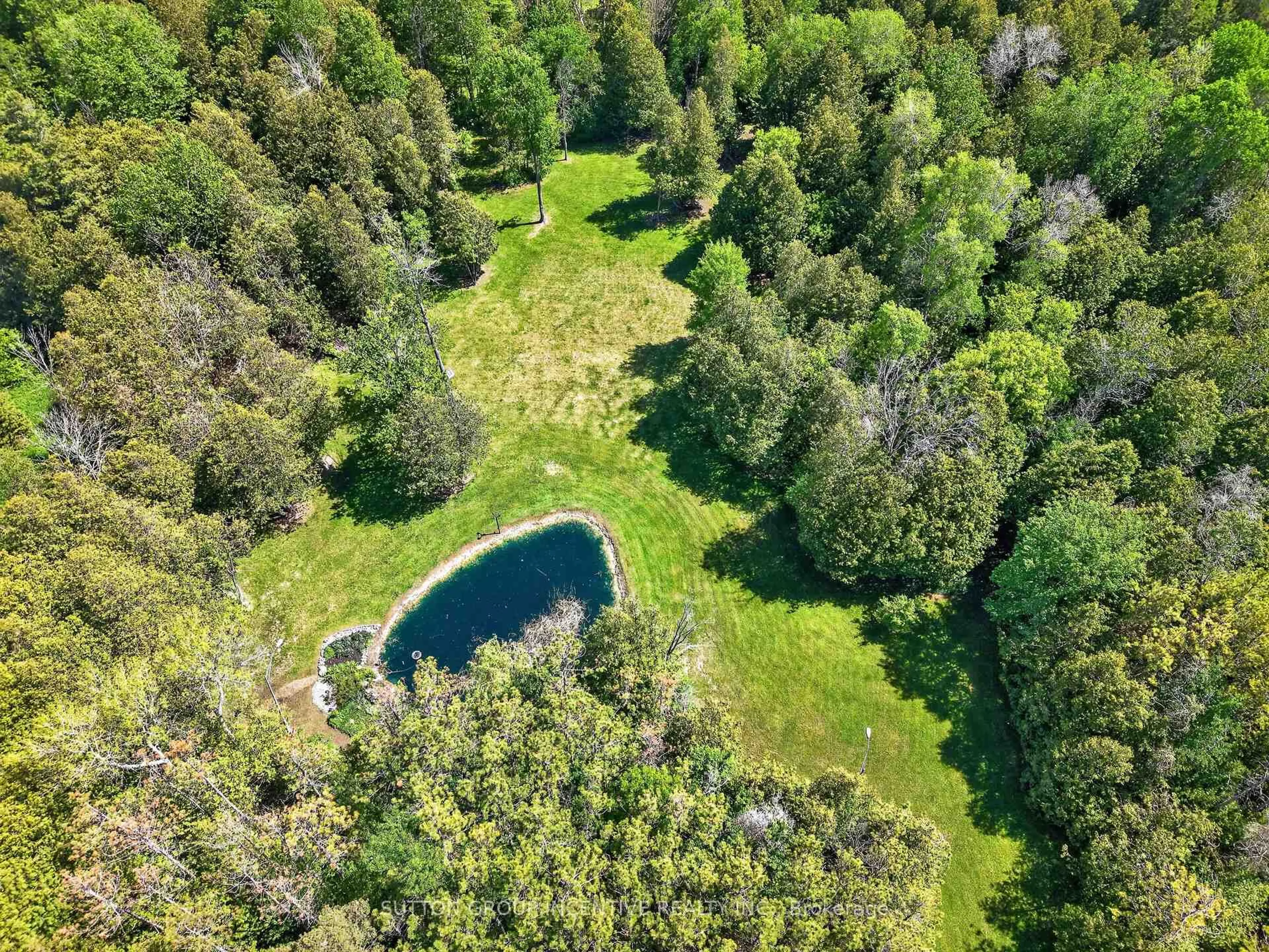 A pic from outside/outdoor area/front of a property/back of a property/a pic from drone, forest/trees view for 6805 8th Line, Essa Ontario L0L 1N0