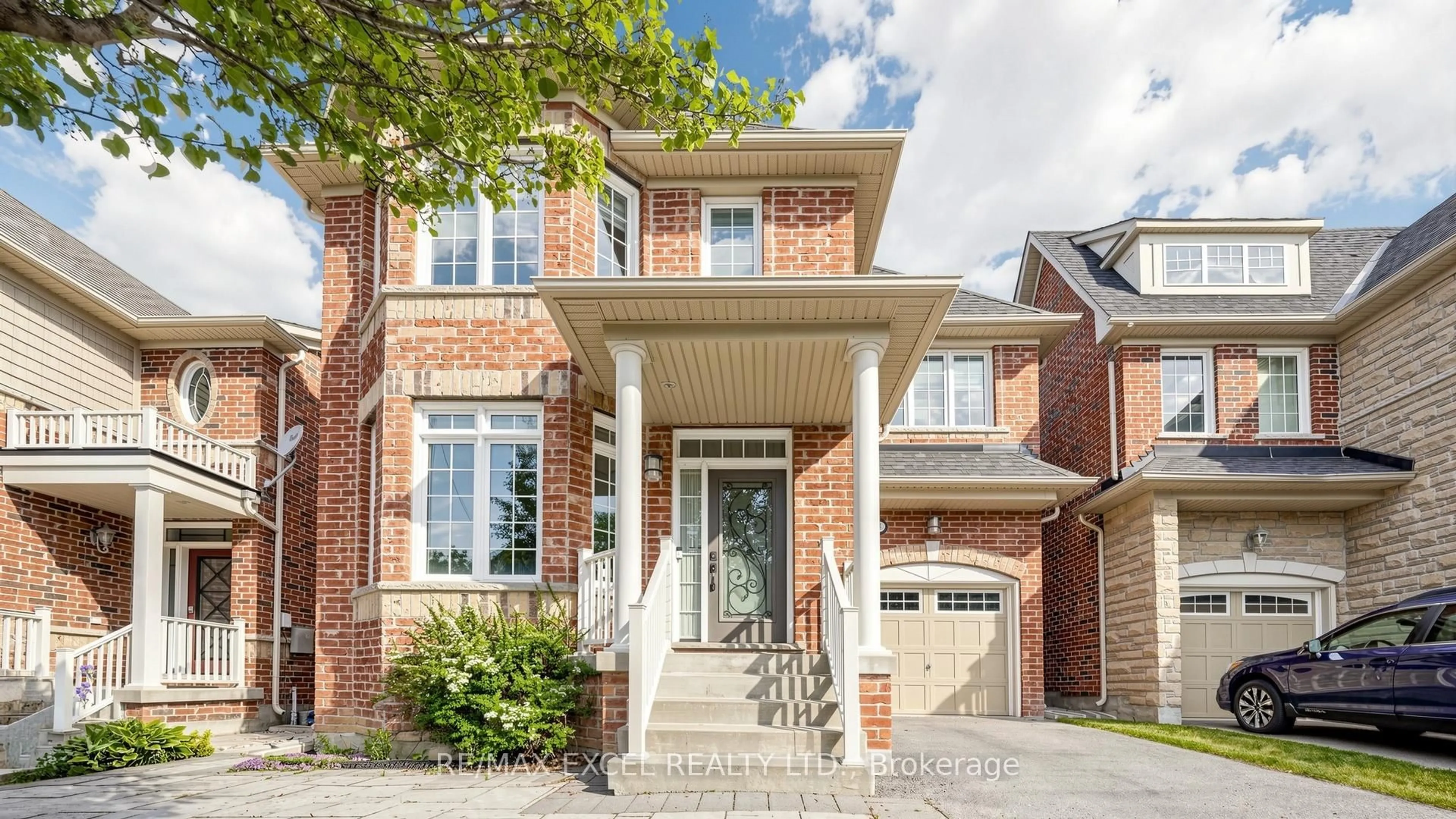 Home with brick exterior material, street for 14 James Joyce Dr, Markham Ontario L6C 0L6