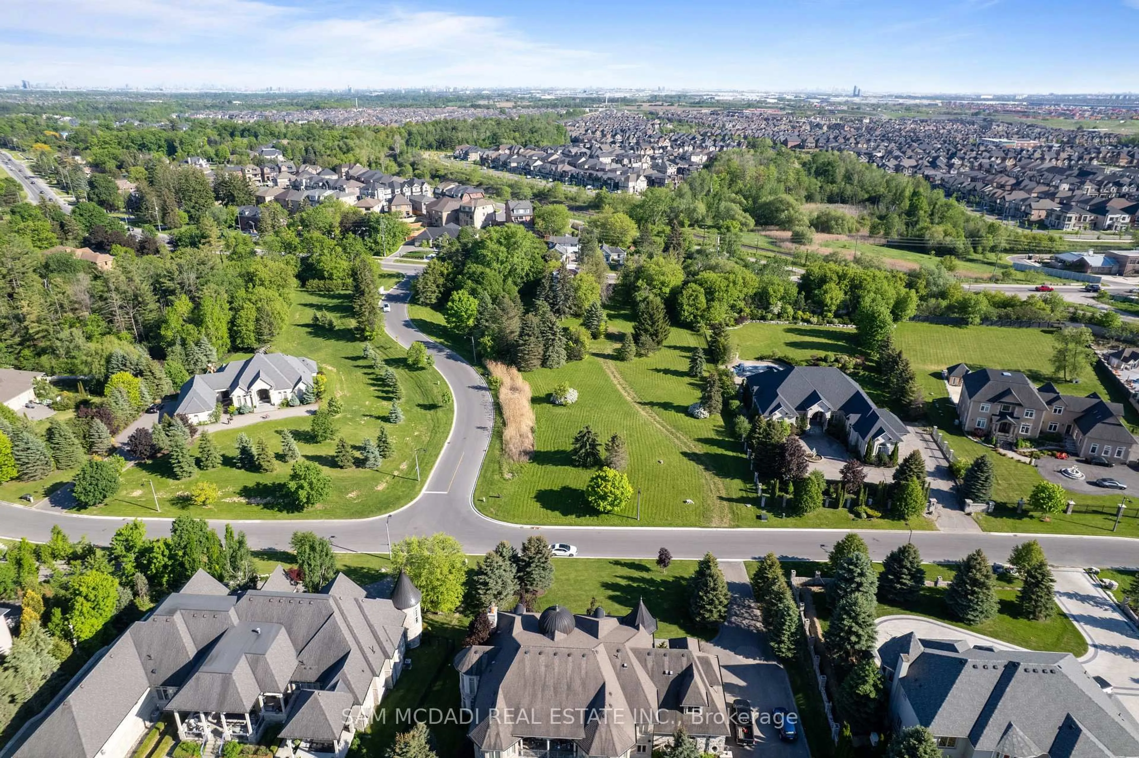 A pic from outside/outdoor area/front of a property/back of a property/a pic from drone, street for 10 Richard Lovat Crt, Vaughan Ontario L0J 1C0