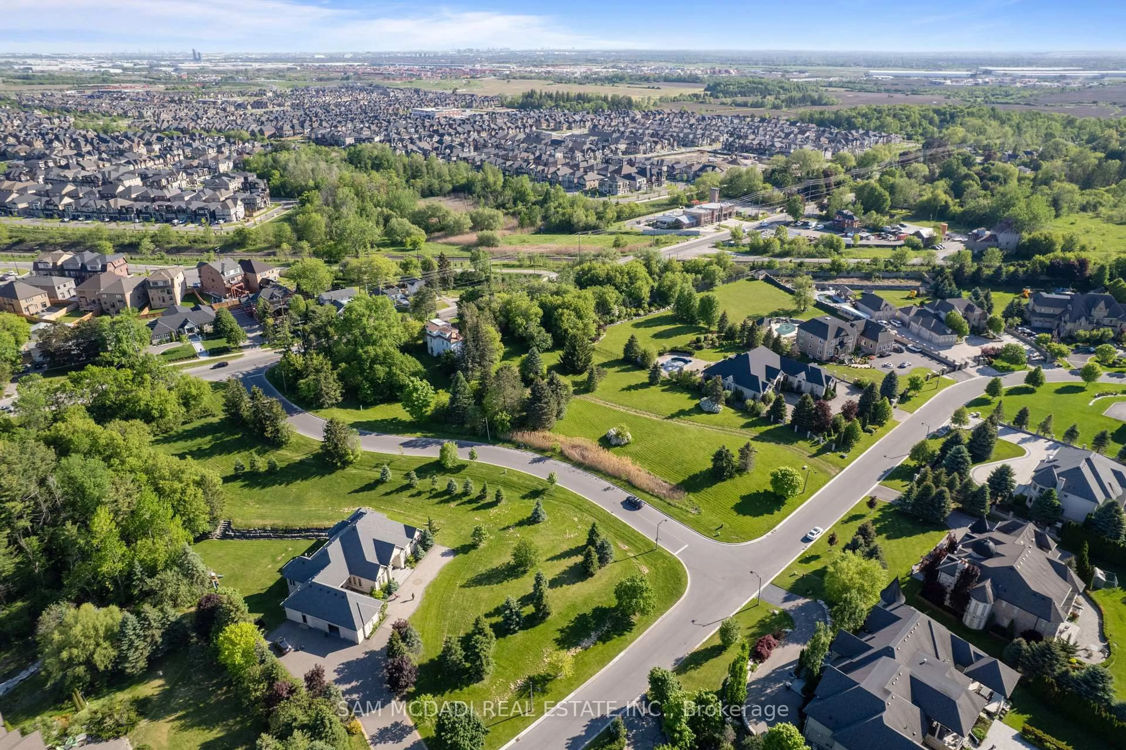 A pic from outside/outdoor area/front of a property/back of a property/a pic from drone, street for 10 Richard Lovat Crt, Vaughan Ontario L0J 1C0