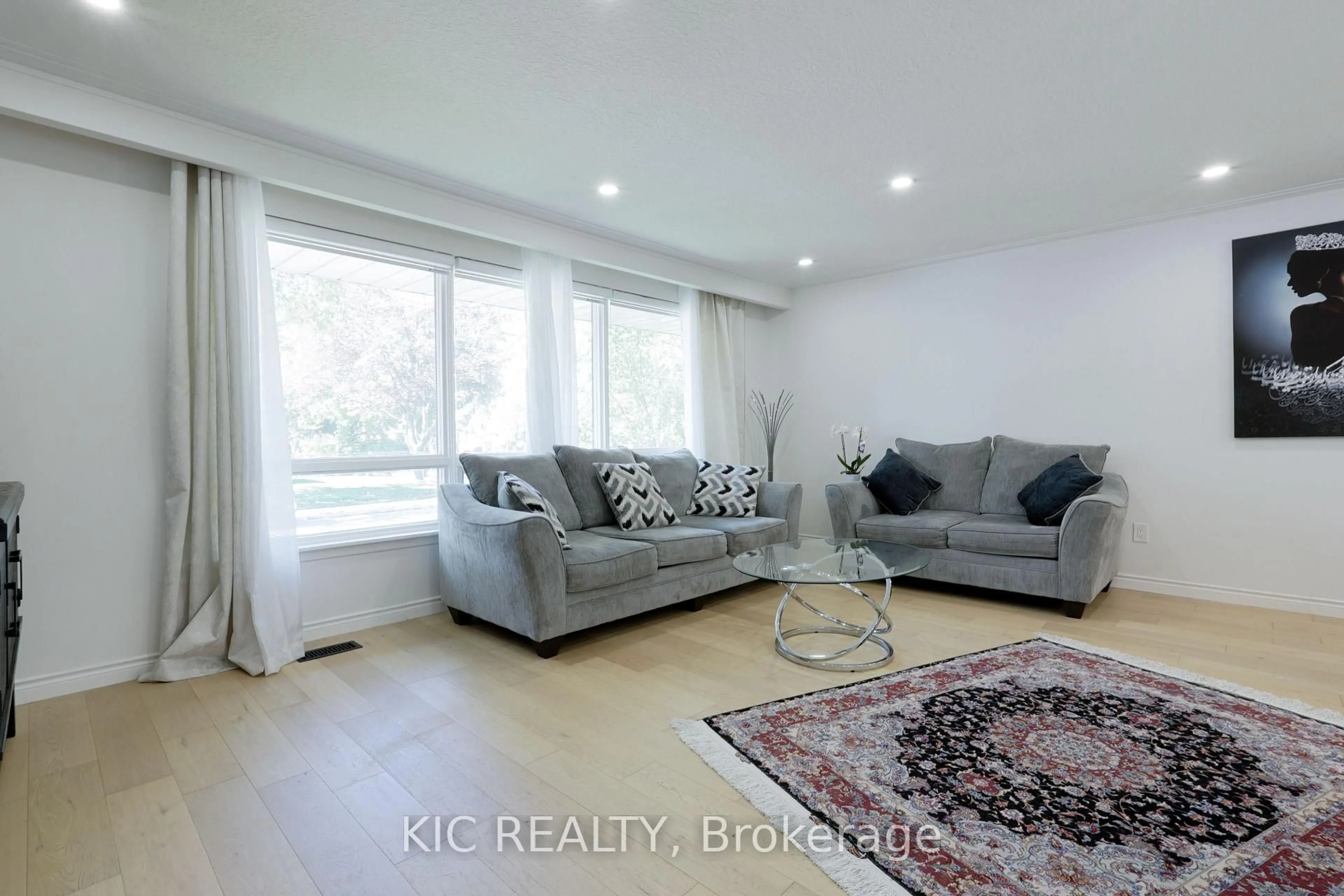 Living room with furniture, wood/laminate floor for 249 Tampico Rd, Richmond Hill Ontario L4C 4R8