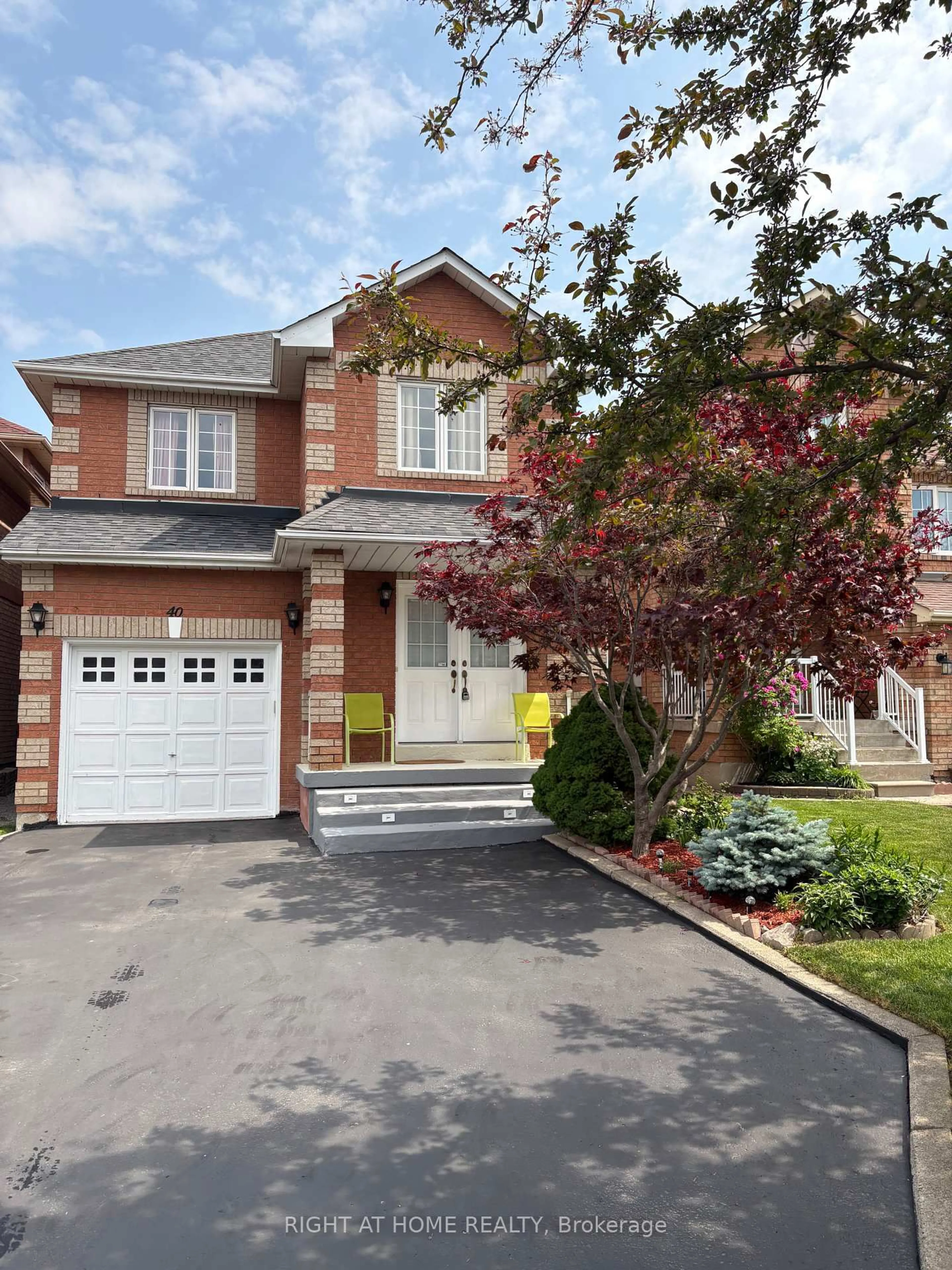 Home with brick exterior material, street for 40 Vogue St, Markham Ontario L3S 4G5