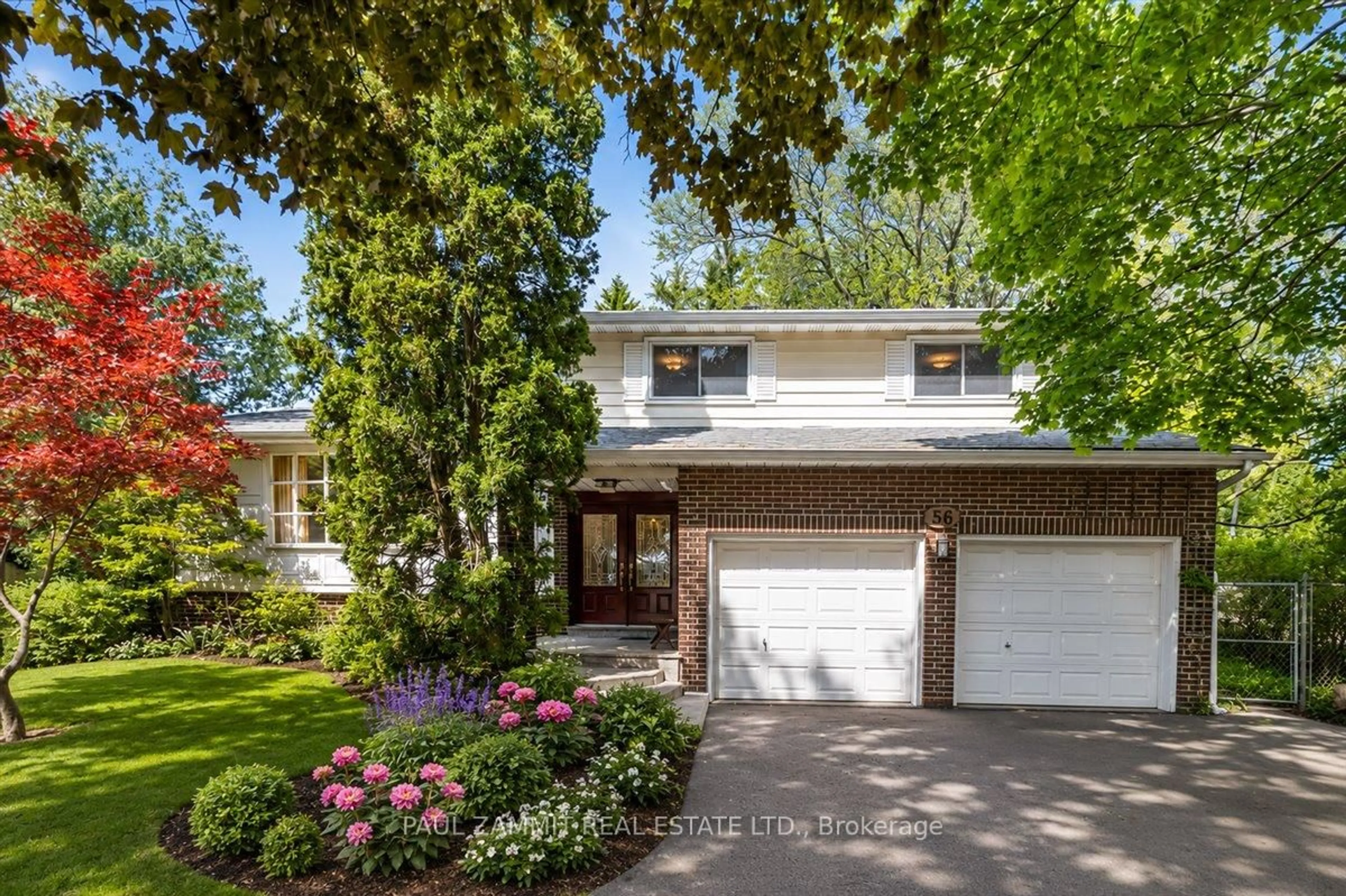 Home with brick exterior material, street for 56 Coral Harbour Cres, Markham Ontario L3T 2Z7