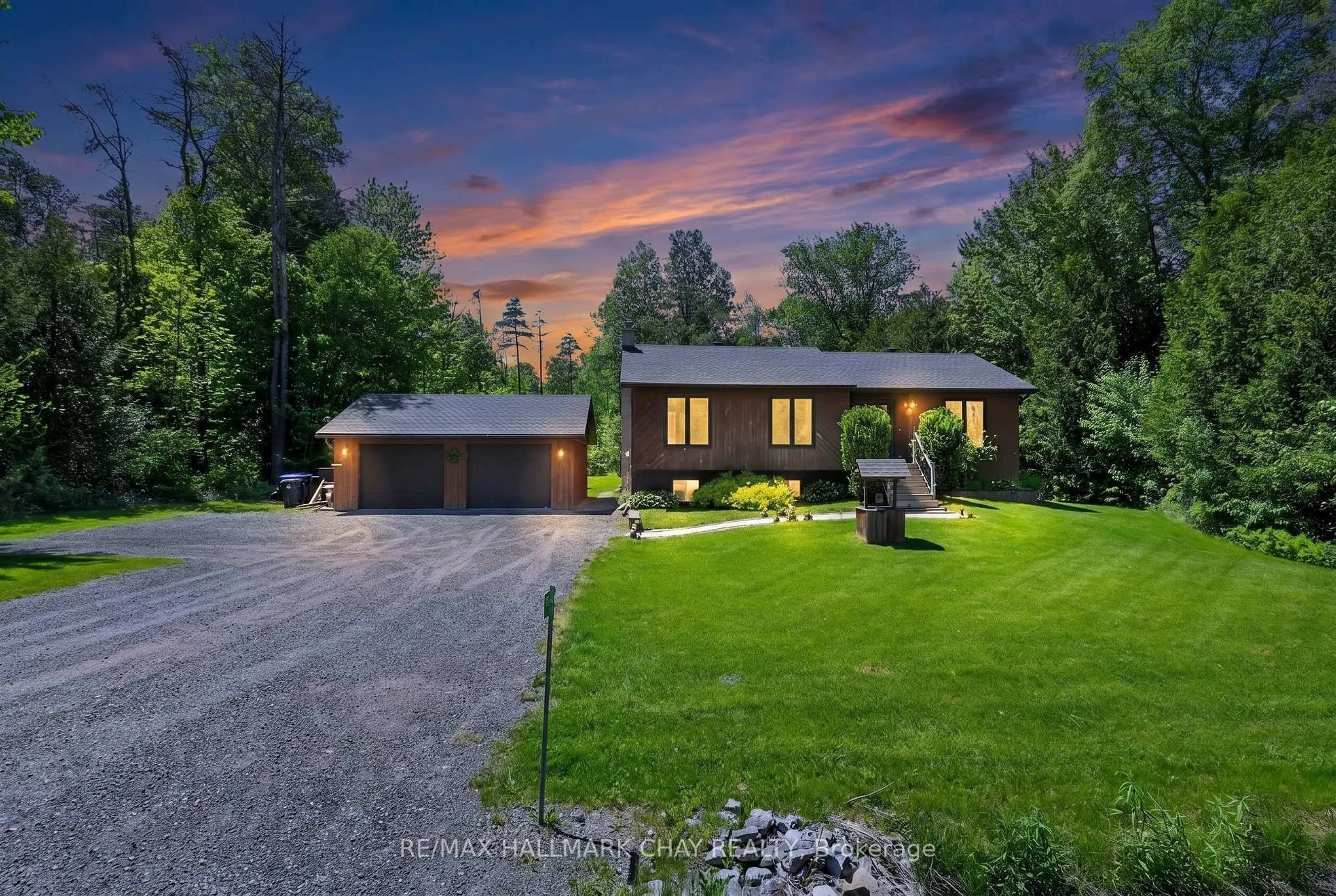 A pic from outside/outdoor area/front of a property/back of a property/a pic from drone, street for 7912 County Road 56 Rd, Essa Ontario L0M 1T0