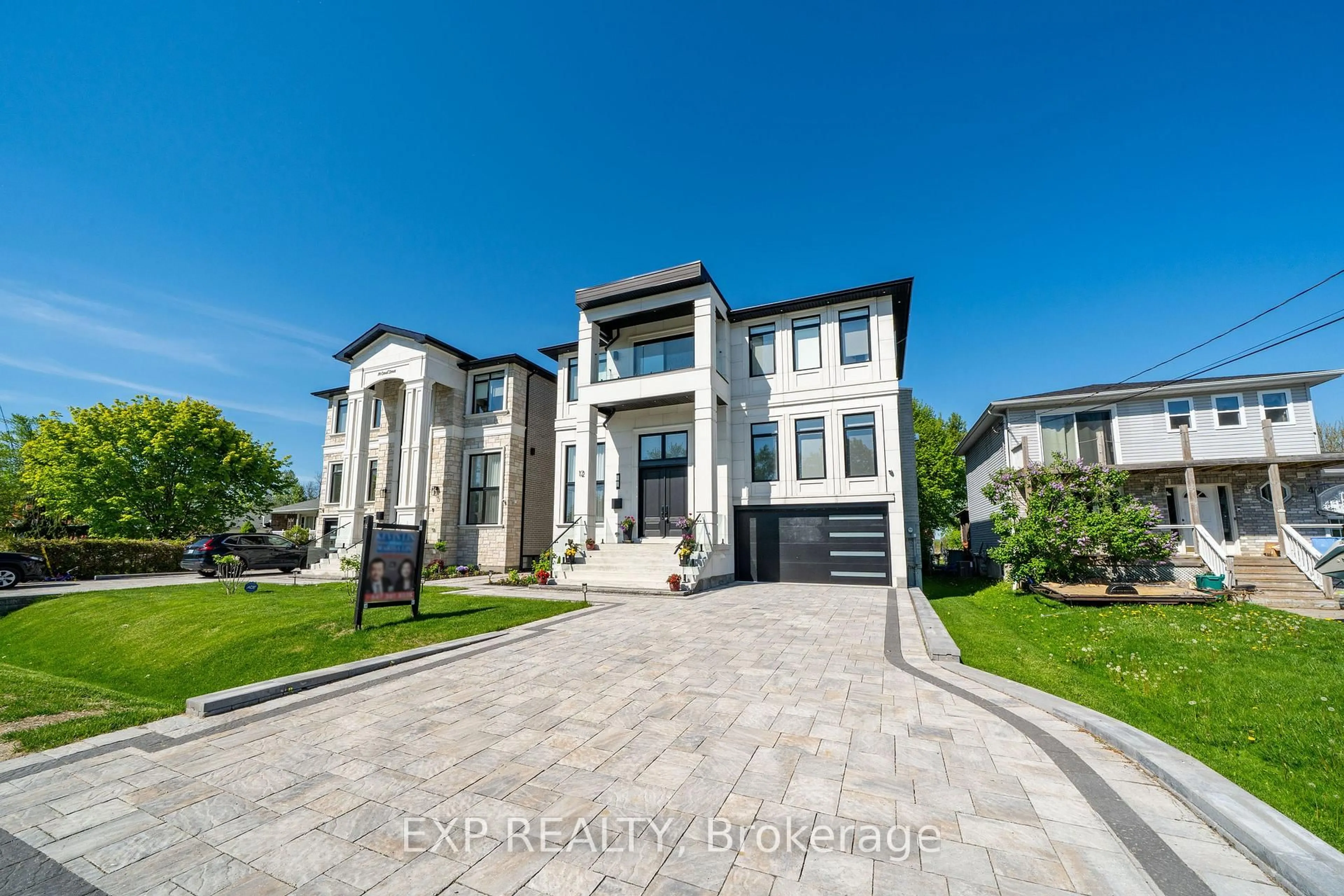 Home with brick exterior material, street for 12 Canal St, Georgina Ontario L4P 1K5