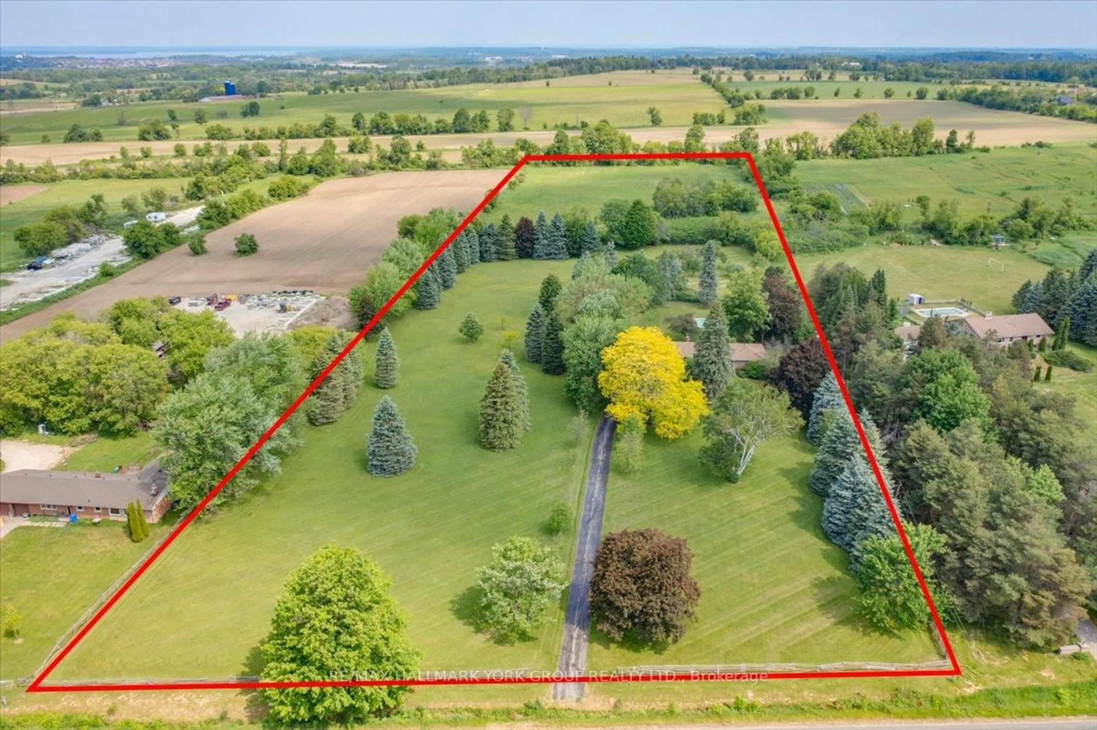 A pic from outside/outdoor area/front of a property/back of a property/a pic from drone, forest/trees view for 2490 Holborn Rd, East Gwillimbury Ontario L0G 1R0