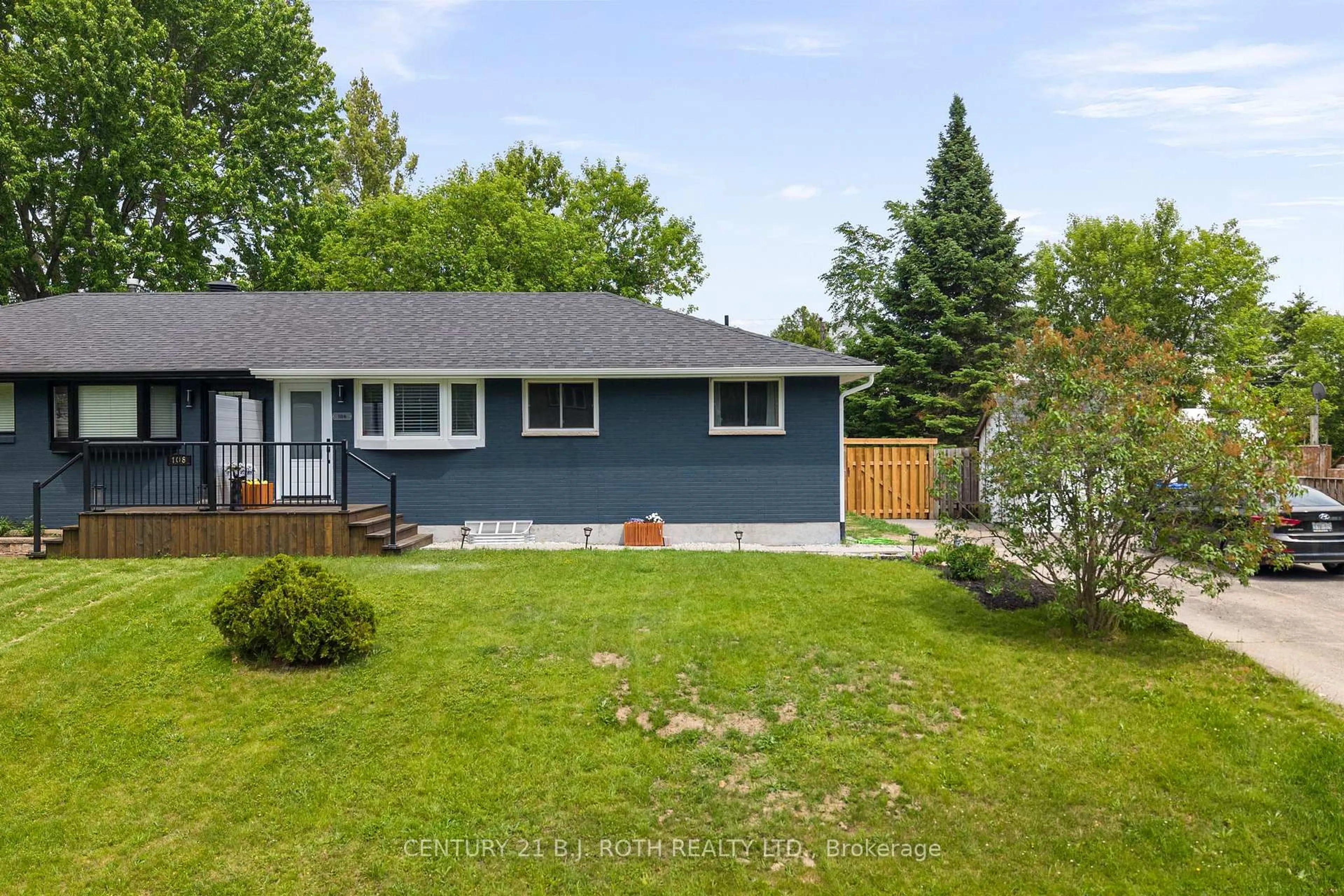 Home with vinyl exterior material, street for 106 Malcolm St, Essa Ontario L0M 1B0