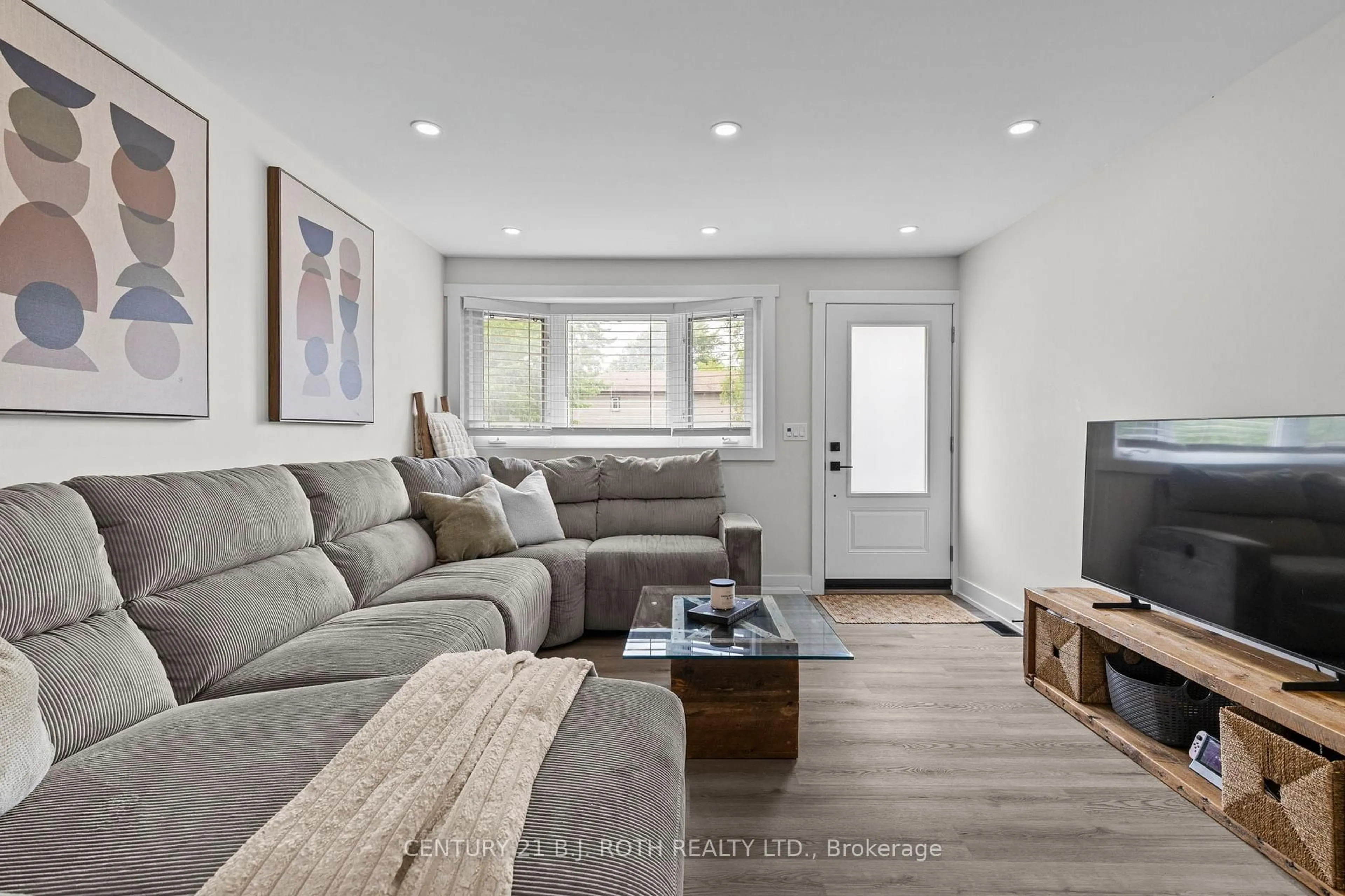 Living room with furniture, unknown for 106 Malcolm St, Essa Ontario L0M 1B0