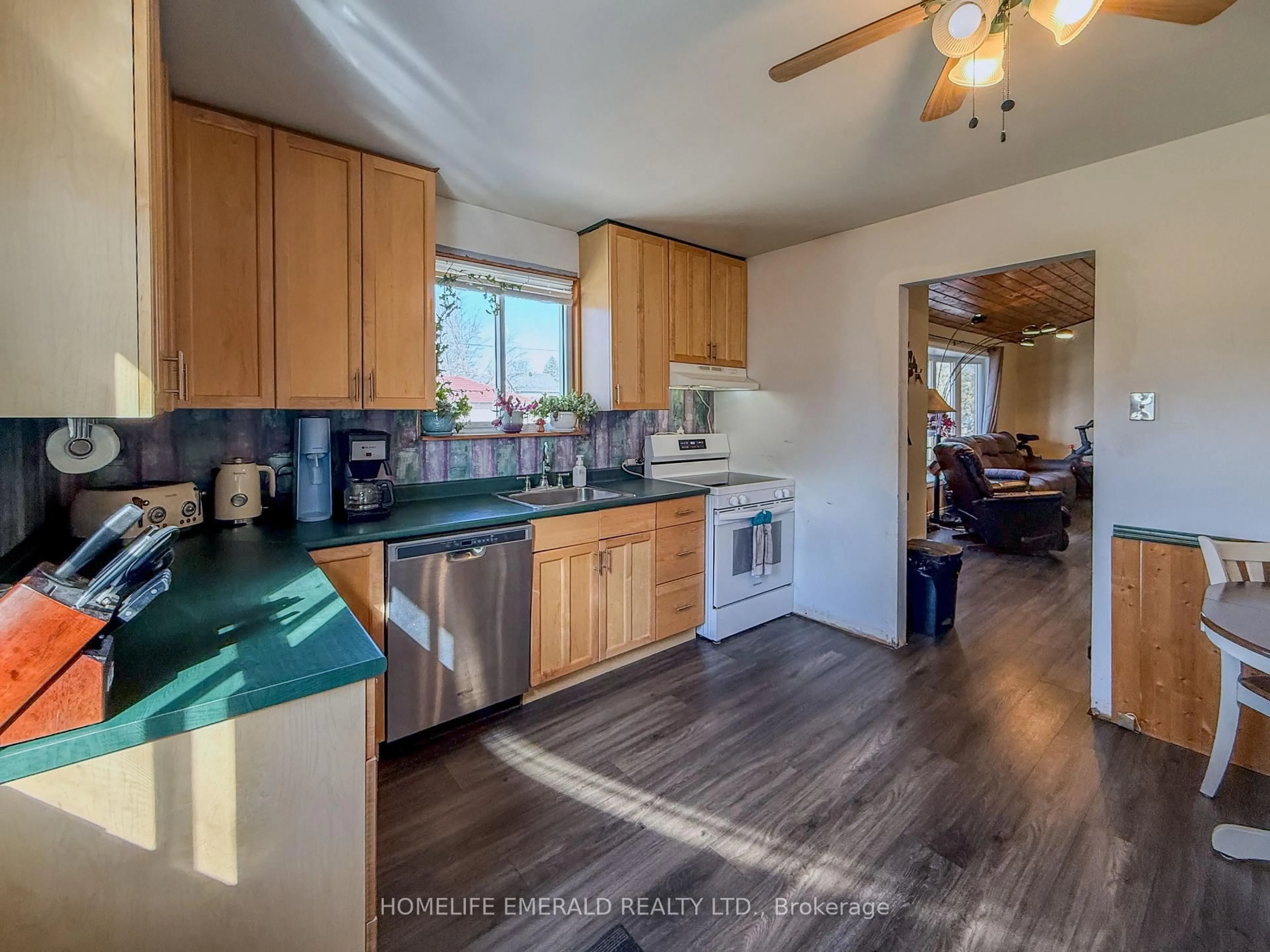 Open concept kitchen, wood/laminate floor for 74 VERNON St, Essa Ontario L0M 1B0