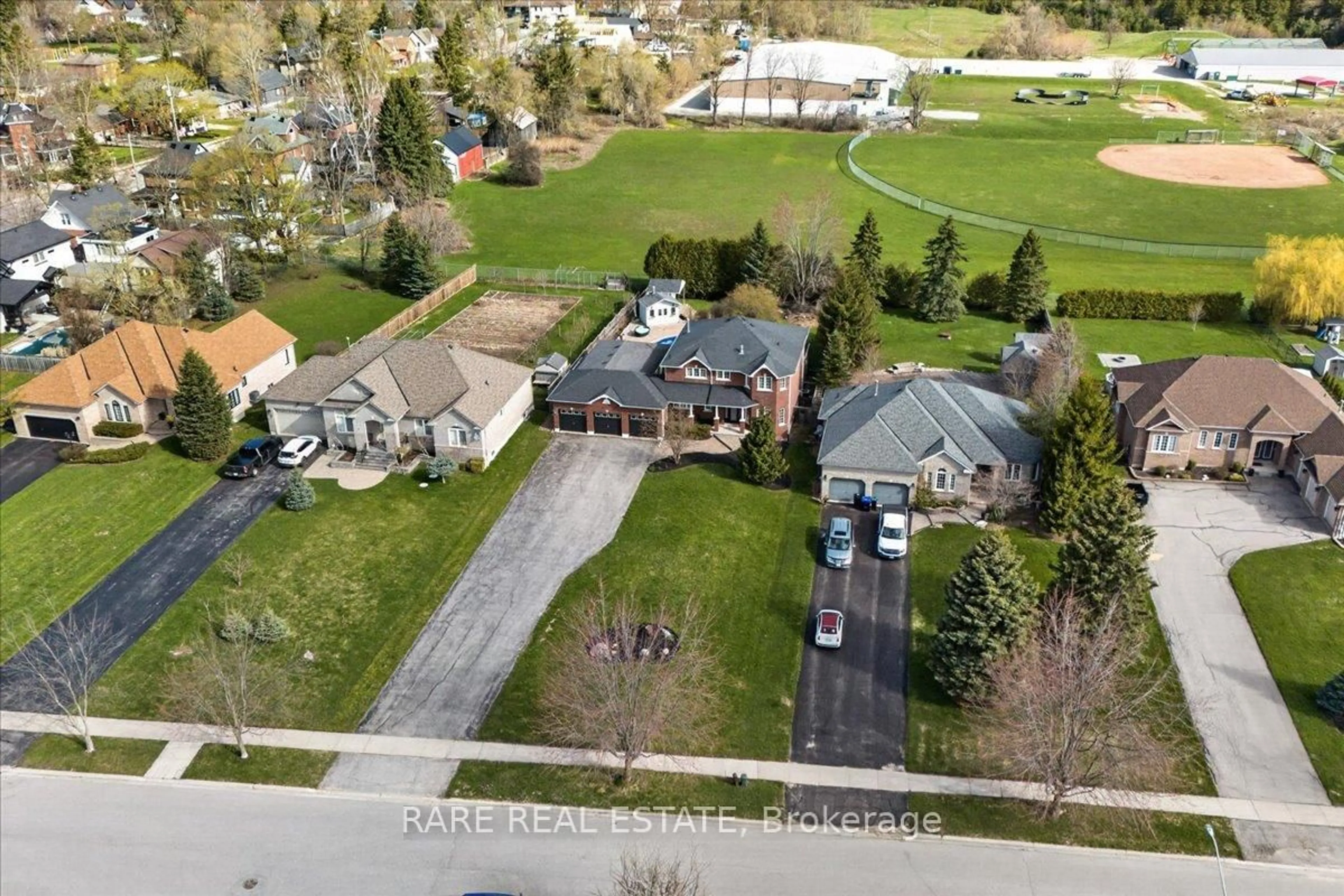 A pic from outside/outdoor area/front of a property/back of a property/a pic from drone, street for 6 Brykman Rd, Essa Ontario L0L 2N2