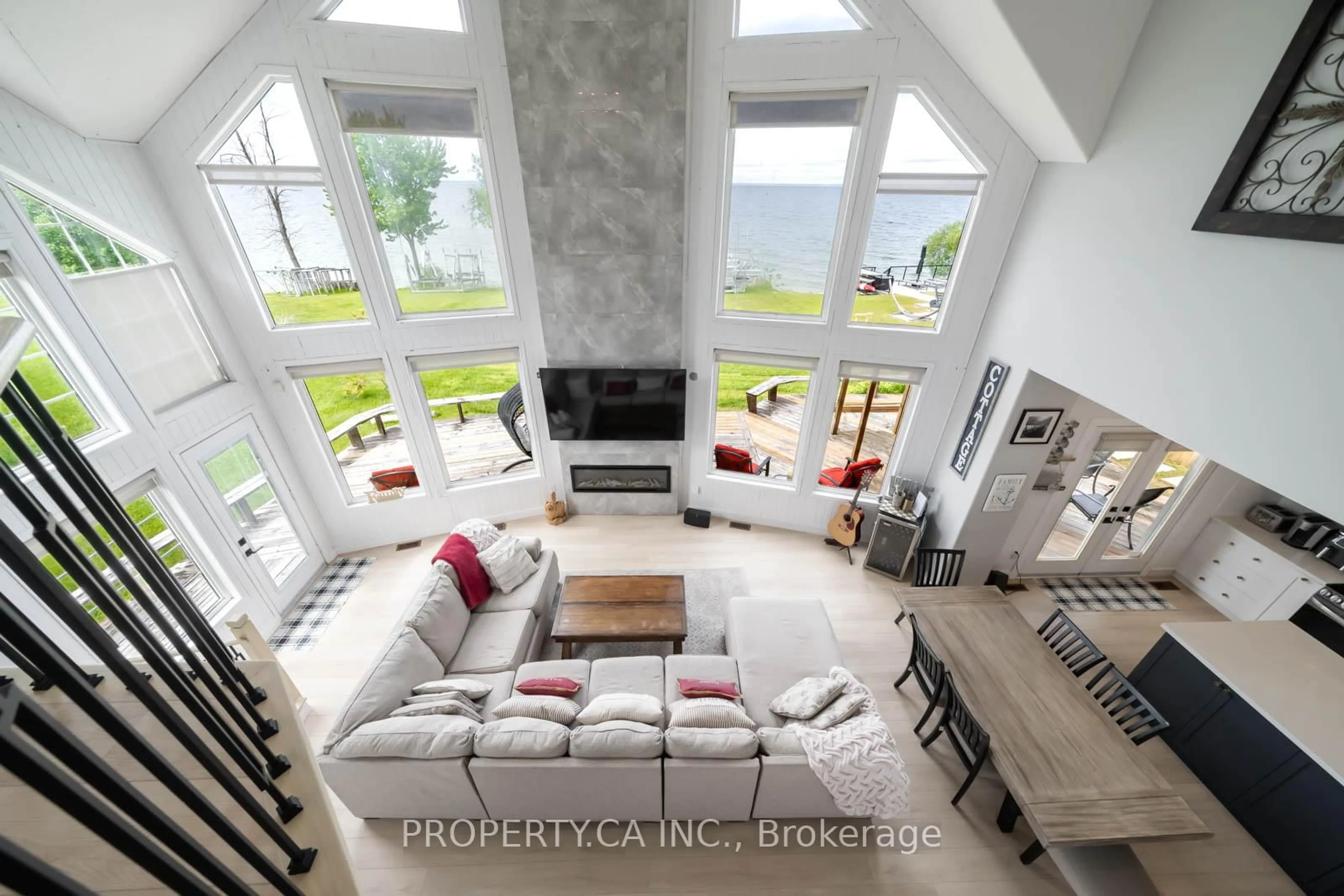 Living room with furniture, ceramic/tile floor for 1283 Chief Joseph Snake Rd, Georgina Islands Ontario L0E 1R0