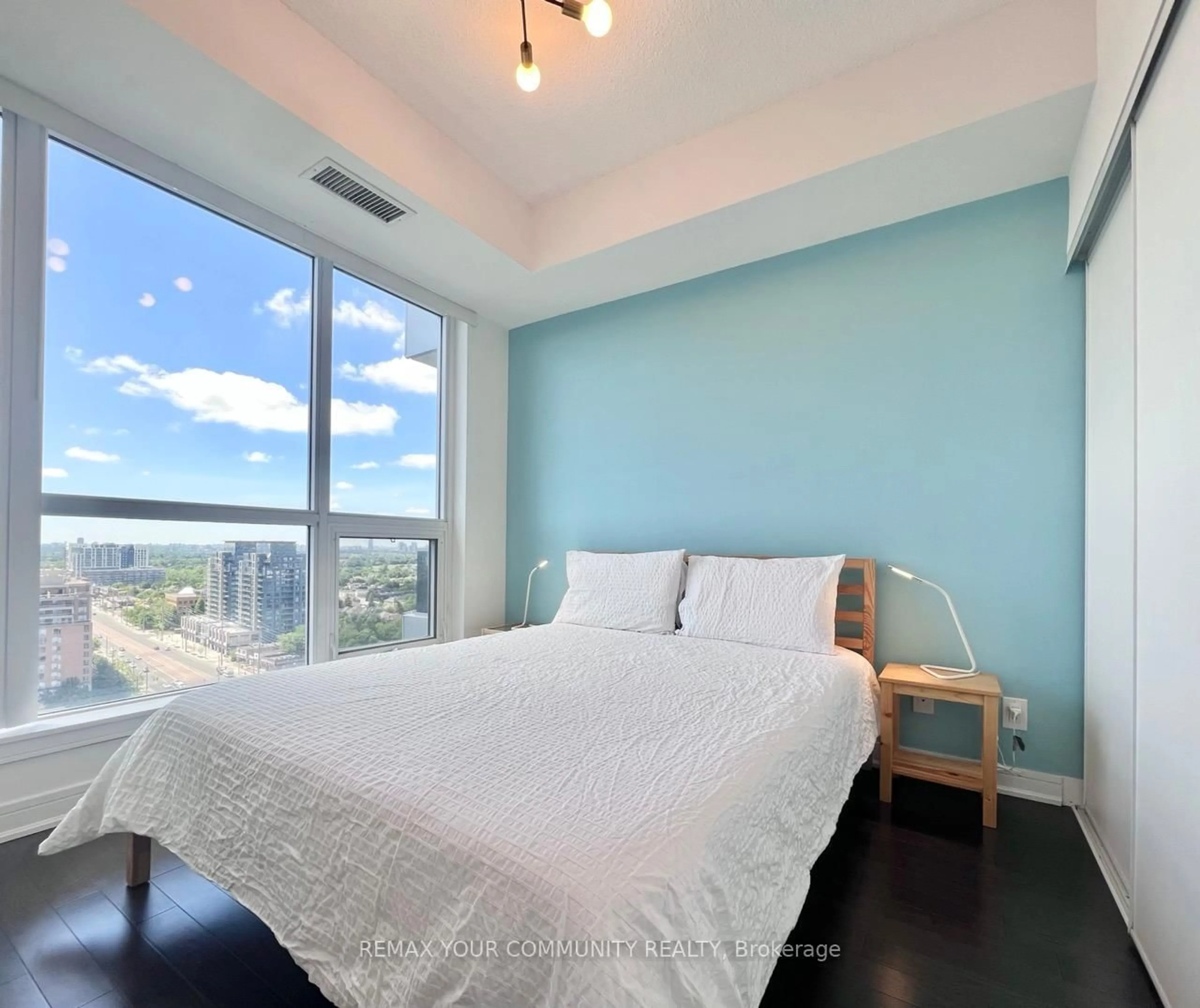 Bedroom with bed, wood/laminate floor for 9201 Yonge St #1804, Richmond Hill Ontario L4C 6Z2