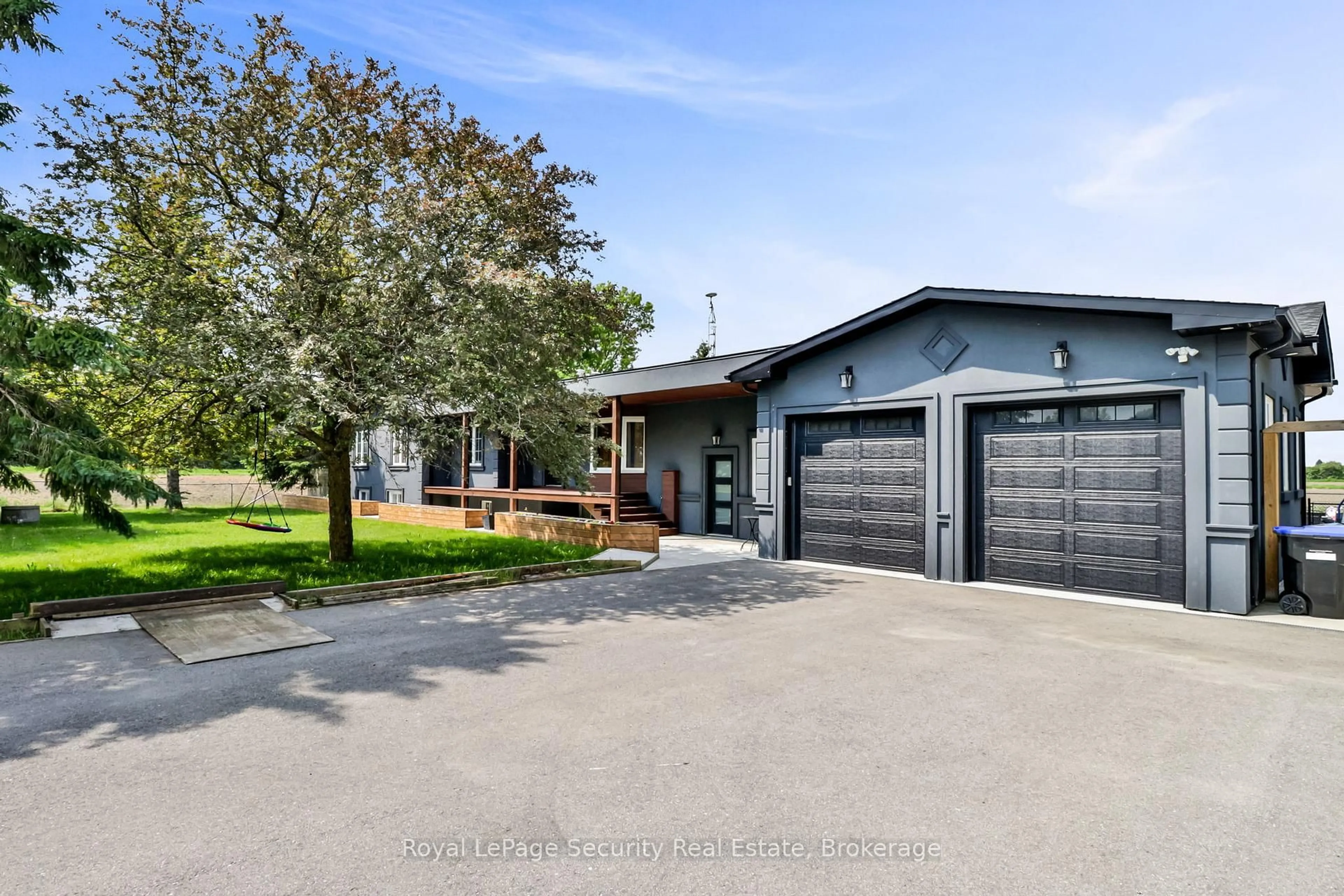 A pic from outside/outdoor area/front of a property/back of a property/a pic from drone, street for 5976 10th Line, Essa Ontario L0L 2N2