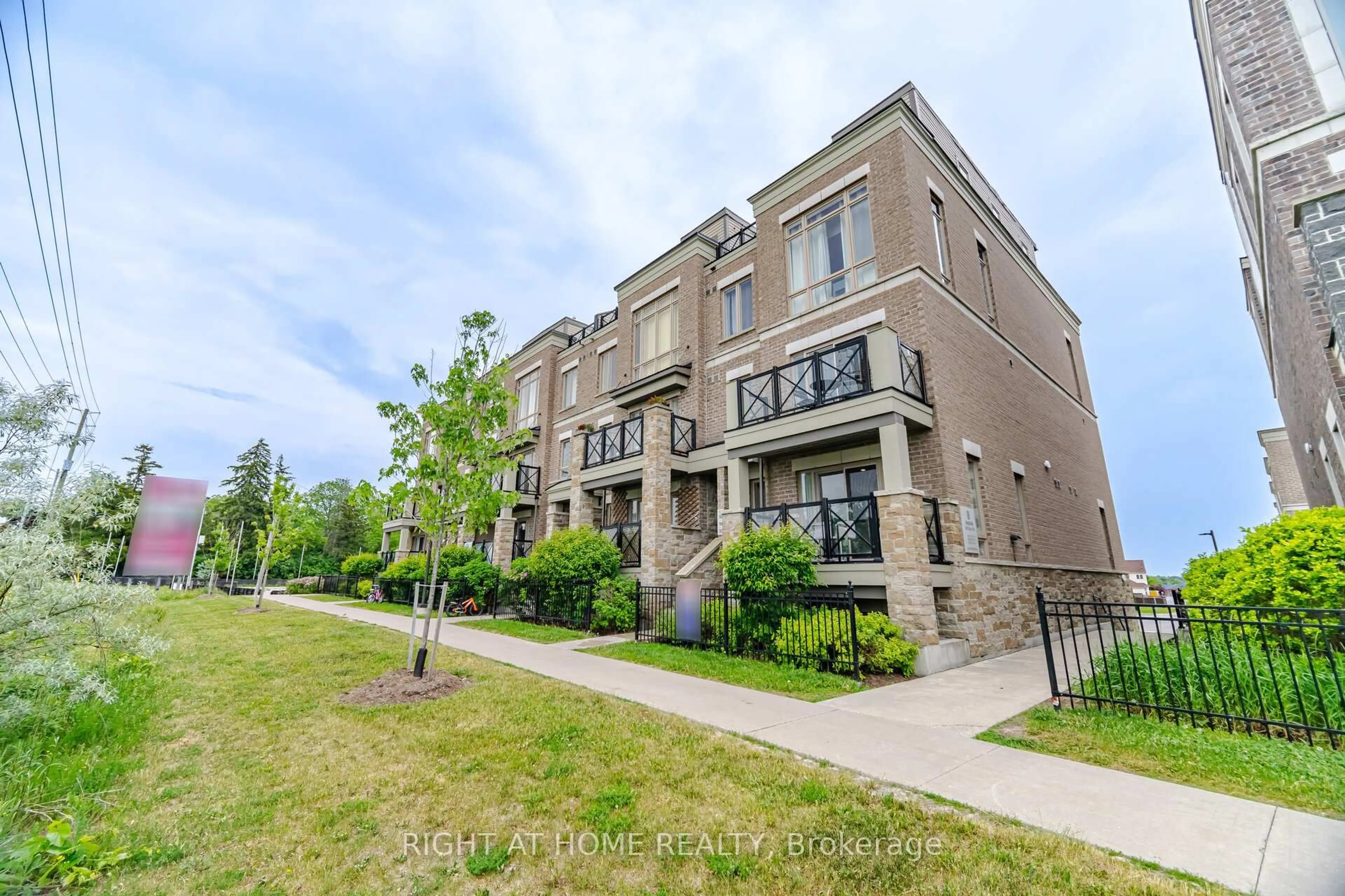 A pic from outside/outdoor area/front of a property/back of a property/a pic from drone, building for 60 Dunsheath Way #702, Markham Ontario L6B 1N3