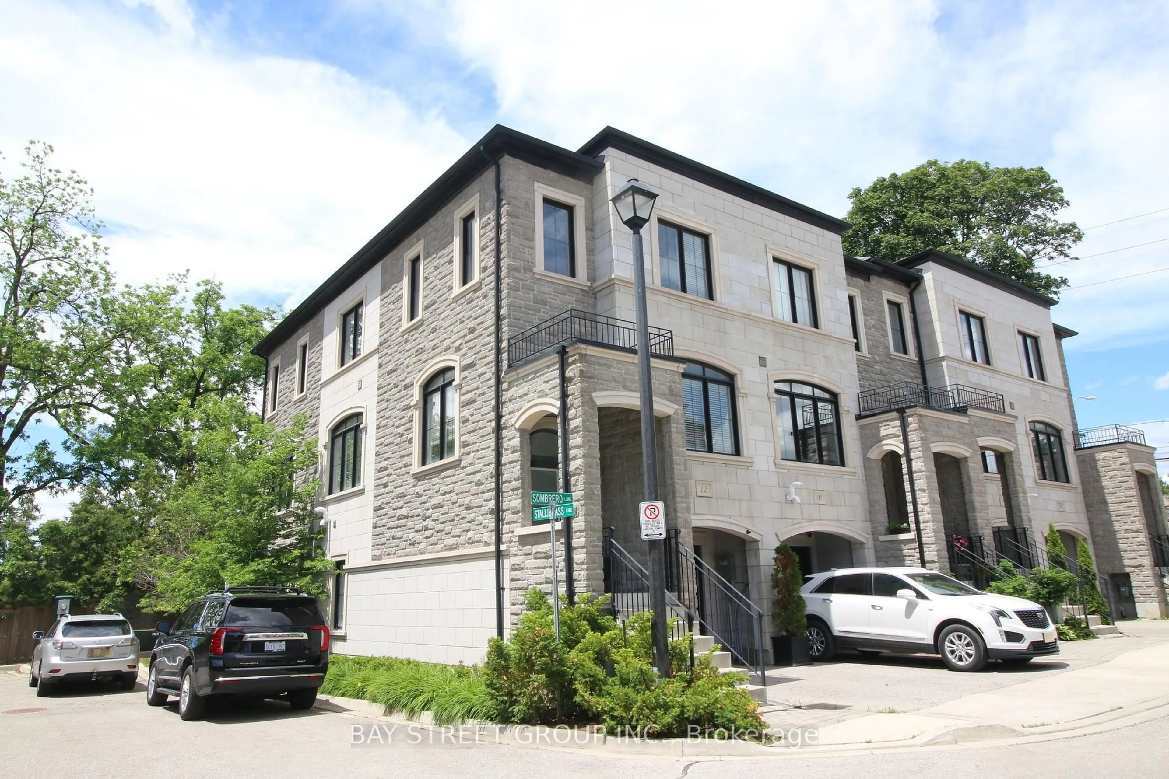 Home with brick exterior material, street for 12 Sombrero Lane, Richmond Hill Ontario L4C 6E5