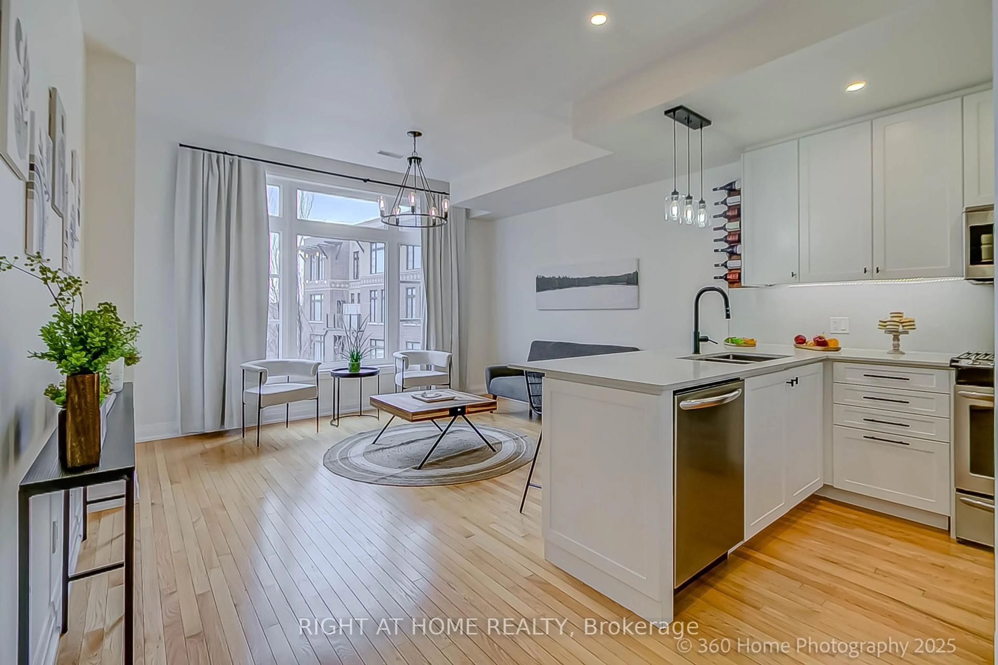 Open concept kitchen, wood/laminate floor for 8169 Kipling Ave #31, Vaughan Ontario L4L 0G4