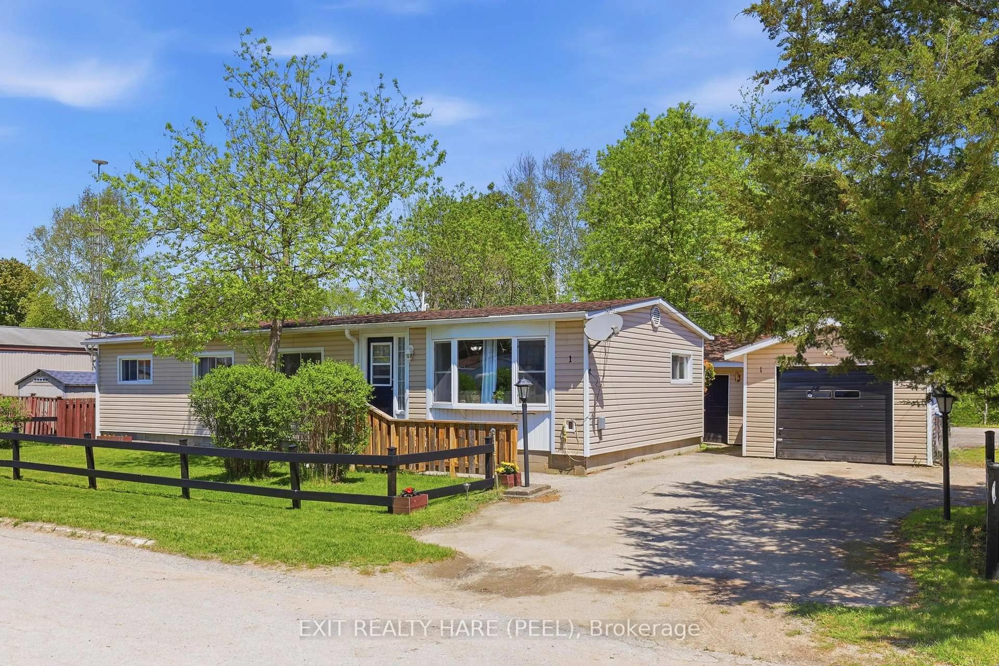 A pic from outside/outdoor area/front of a property/back of a property/a pic from drone, street for 1 Centre Park St, Essa Ontario L3W 0A5
