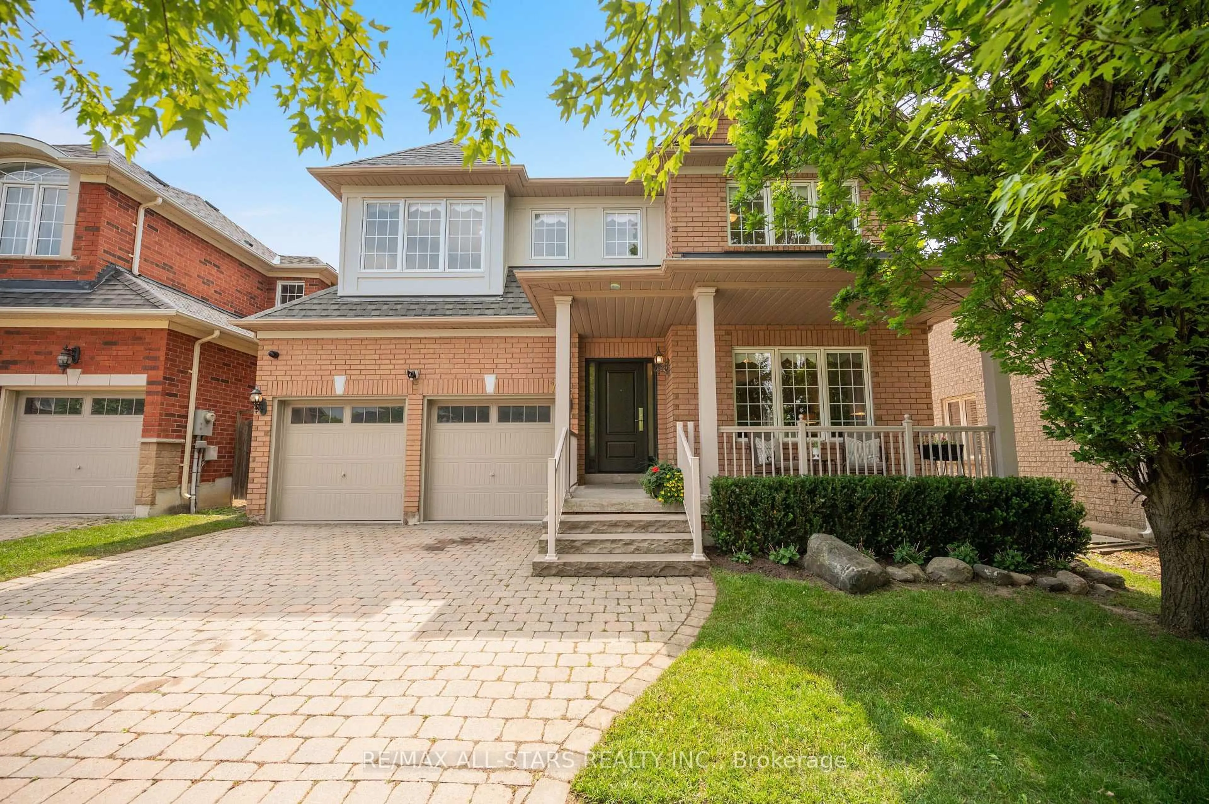 Home with brick exterior material, street for 7 Wood Thrush Ave, Markham Ontario L3S 4A8