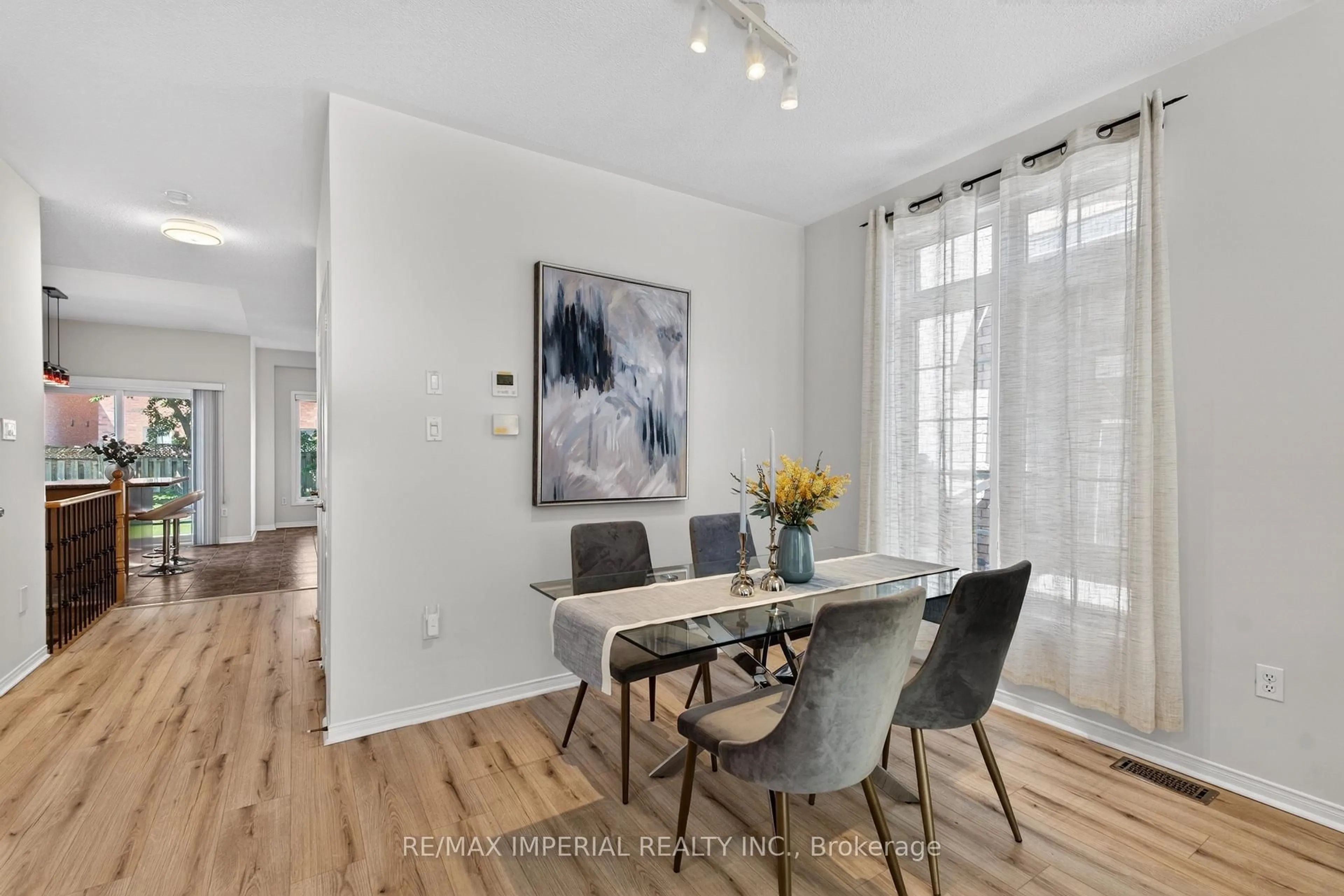Dining room, wood/laminate floor for 18 Davidoff St, Markham Ontario L6E 1P6