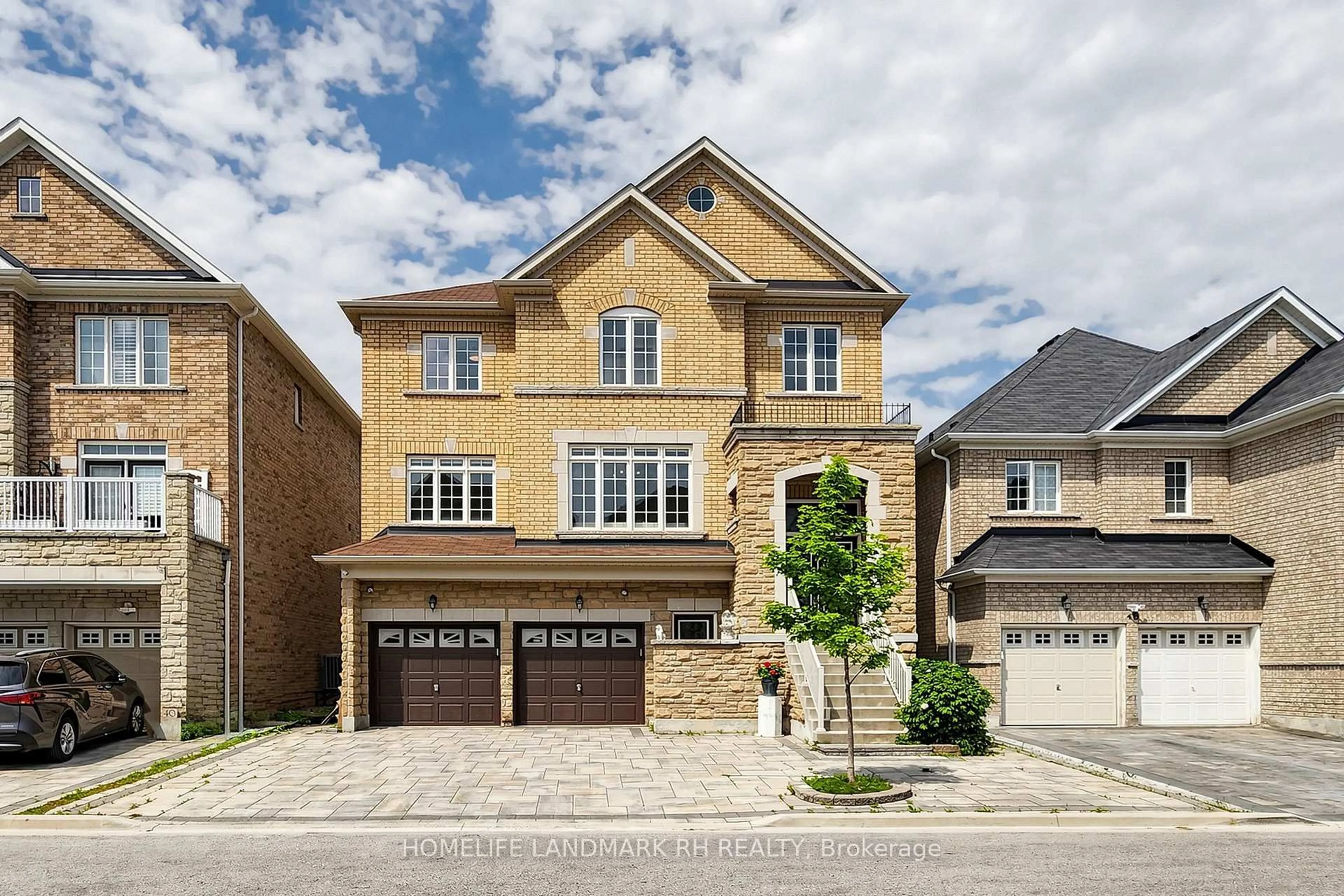 Home with brick exterior material, street for 42 Begonia St, Markham Ontario L6E 0N6