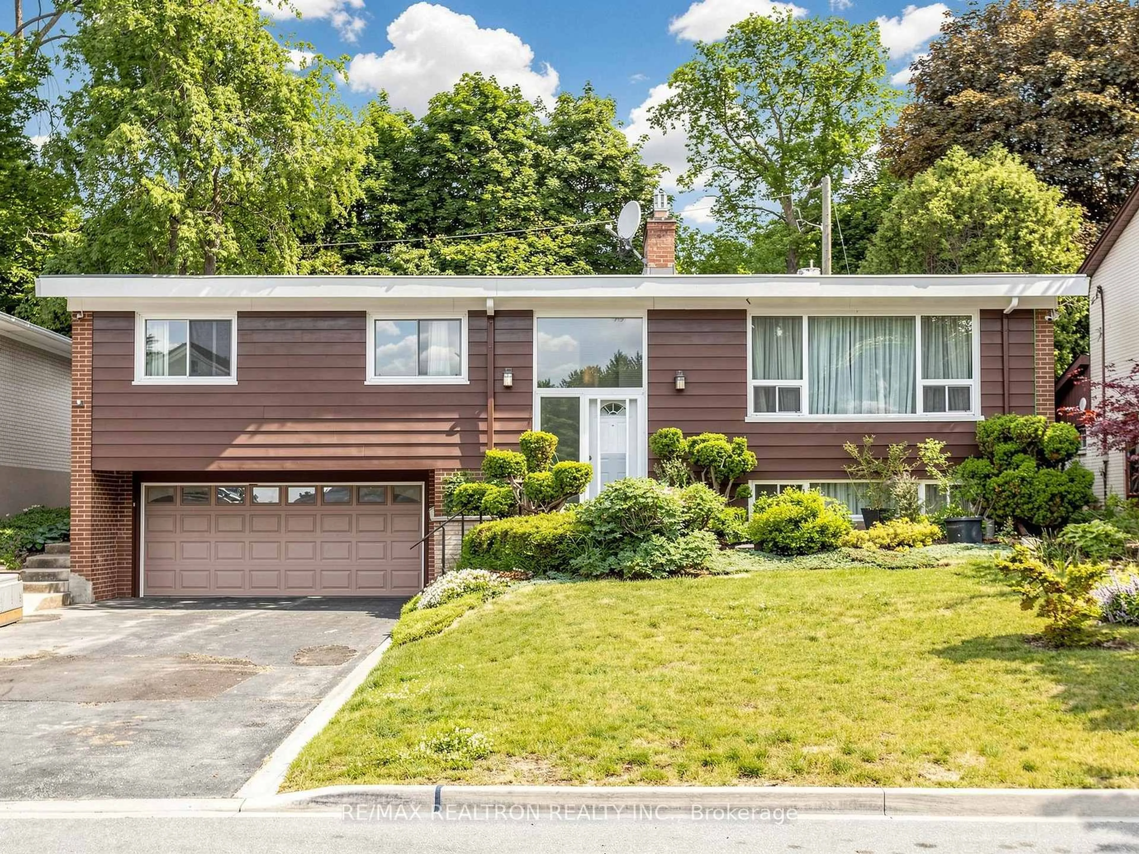 Home with vinyl exterior material, street for 24 Dalmeny Rd, Markham Ontario L3T 1L9