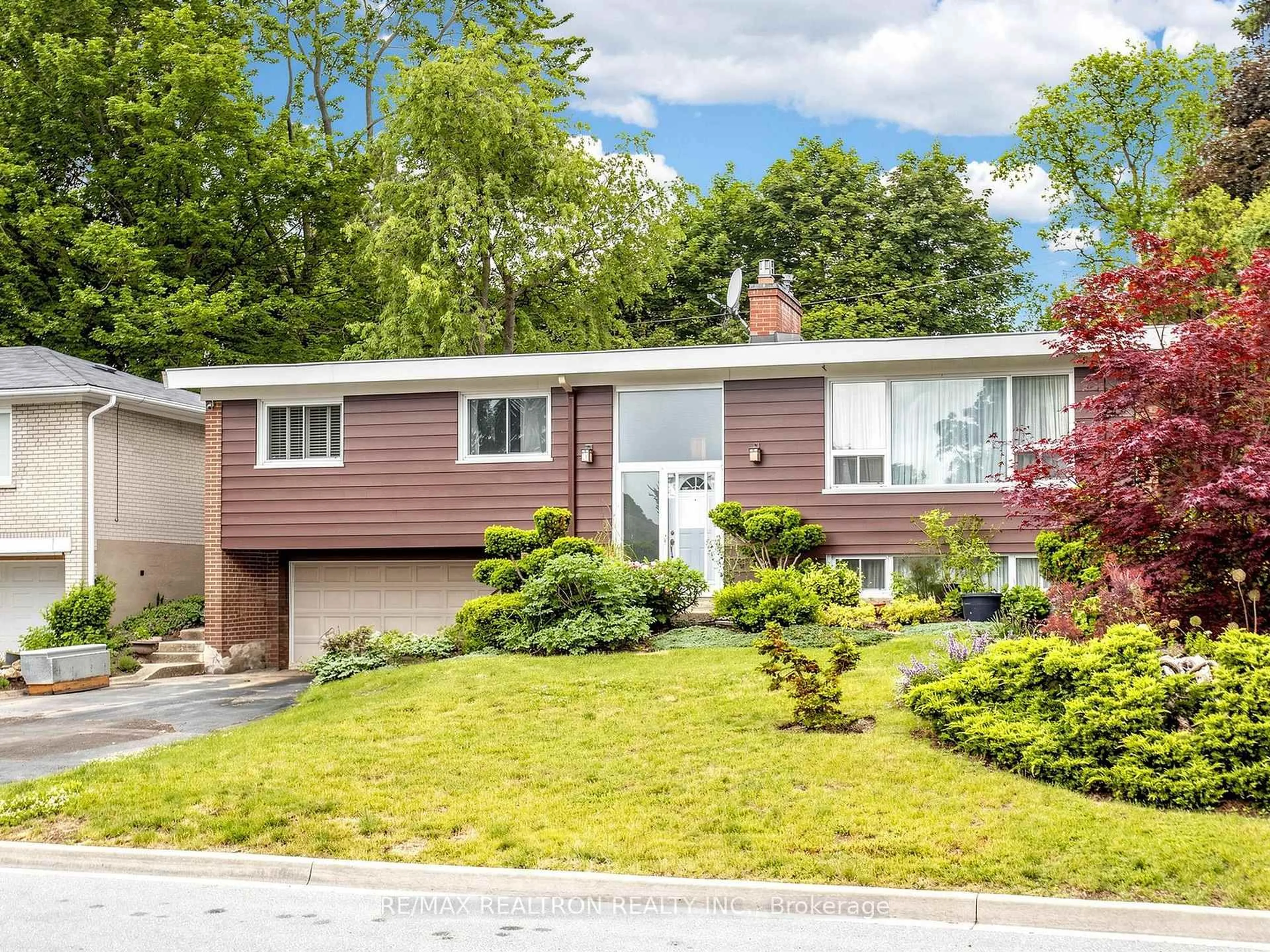 Home with vinyl exterior material, street for 24 Dalmeny Rd, Markham Ontario L3T 1L9
