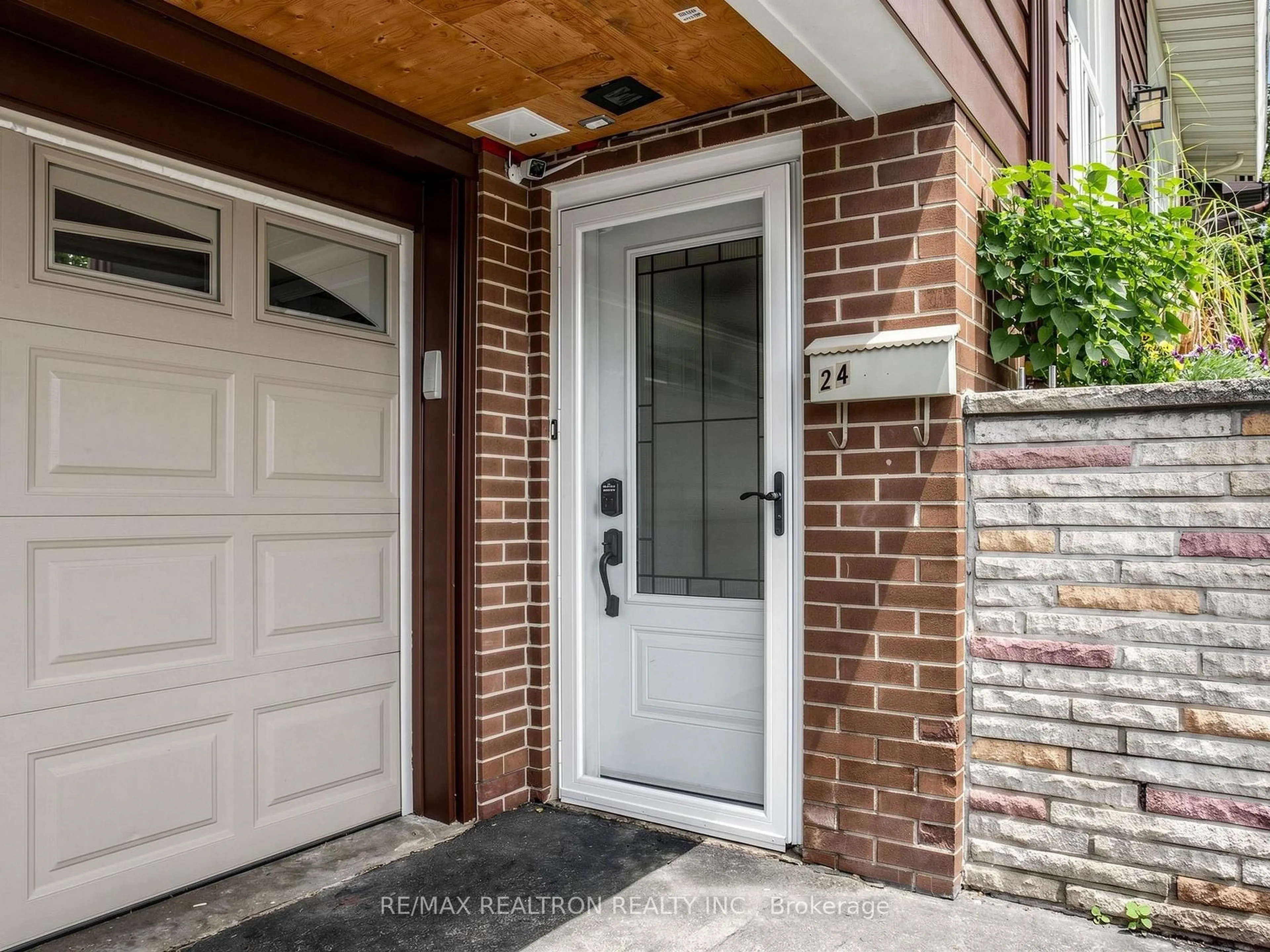 Home with brick exterior material, street for 24 Dalmeny Rd, Markham Ontario L3T 1L9