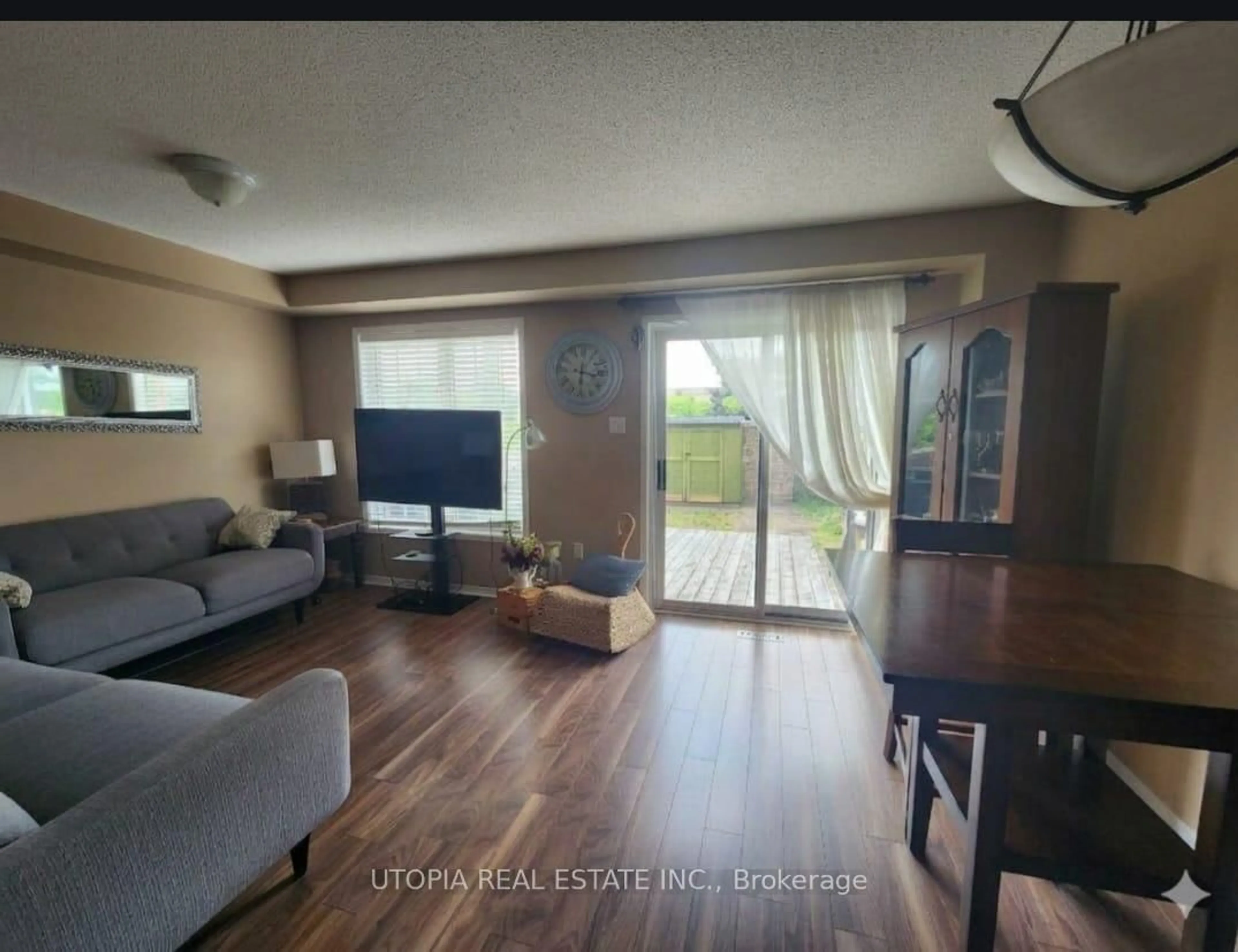 Living room with furniture, wood/laminate floor for 26 Lucena Cres, Vaughan Ontario L6A 2W6