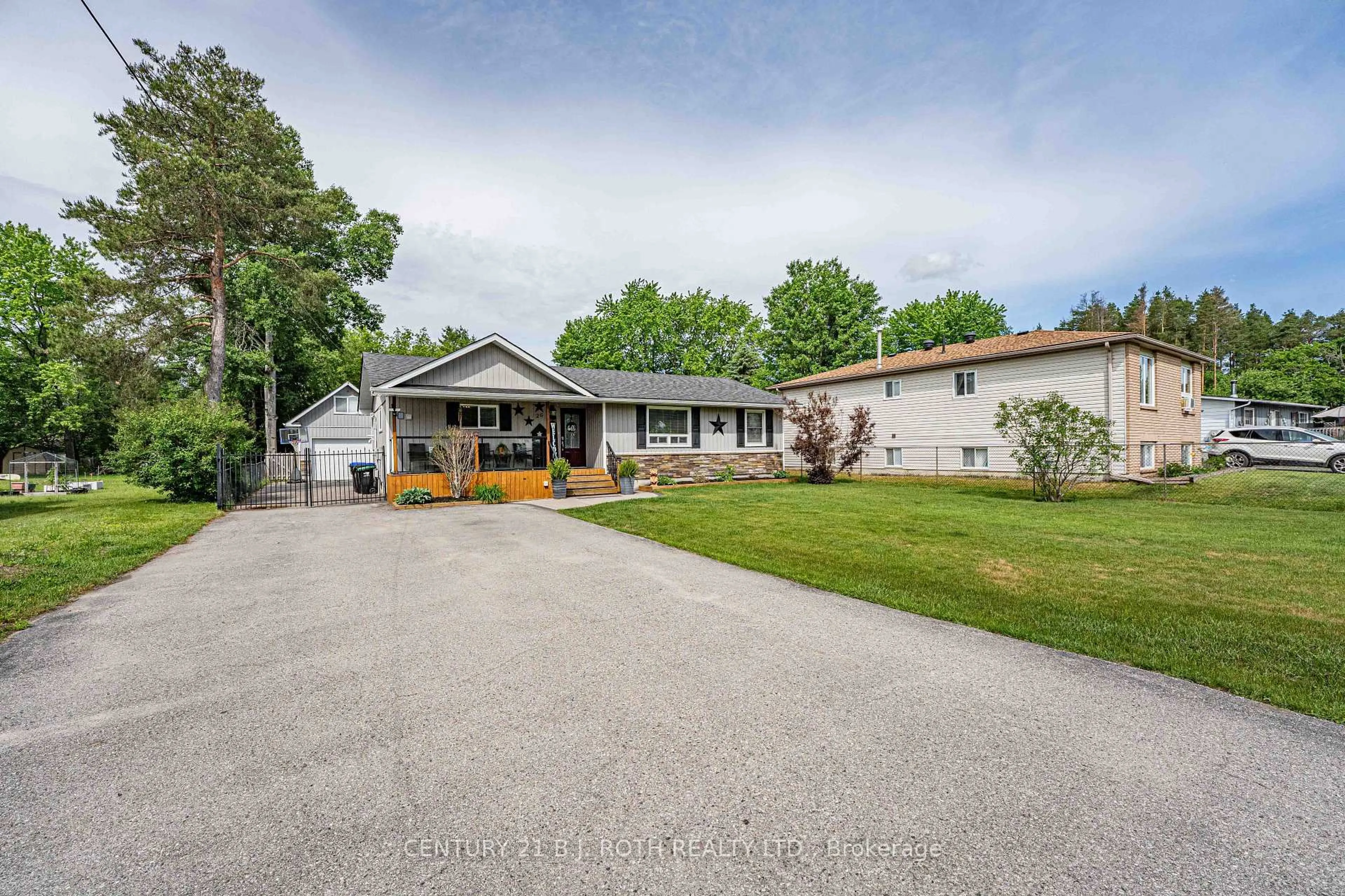 A pic from outside/outdoor area/front of a property/back of a property/a pic from drone, unknown for 26 Coulson Ave, Essa Ontario L0M 1B3
