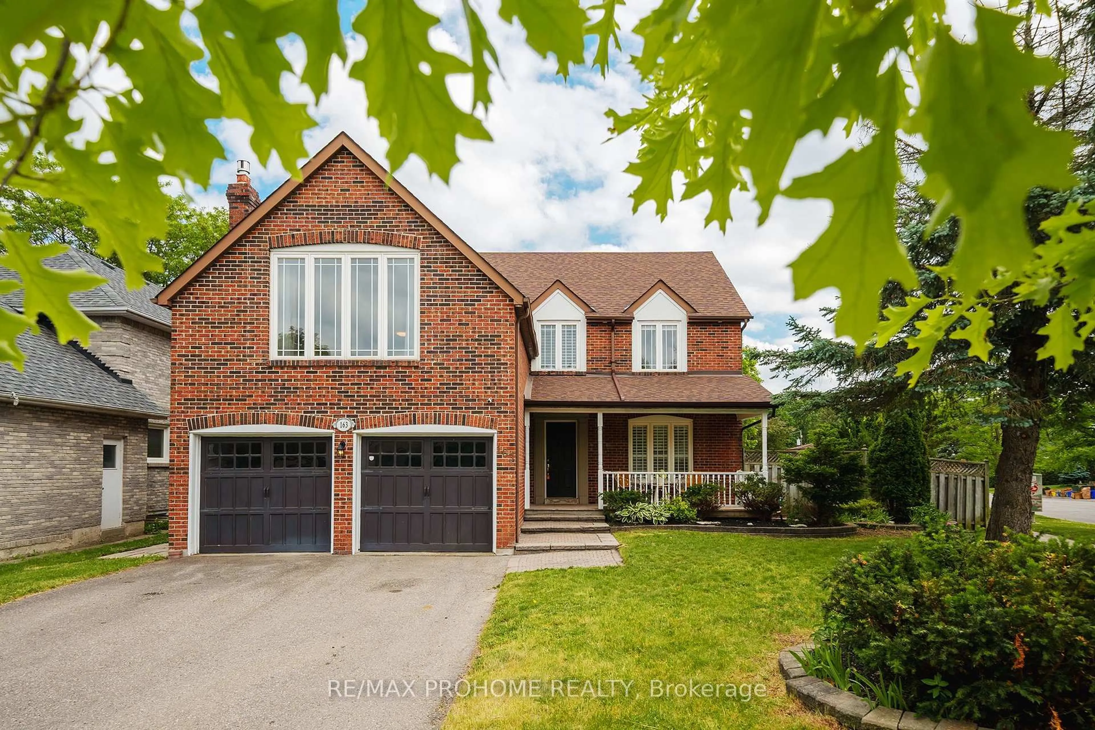 Home with brick exterior material, street for 163 Carlton Rd, Markham Ontario L3R 3L7