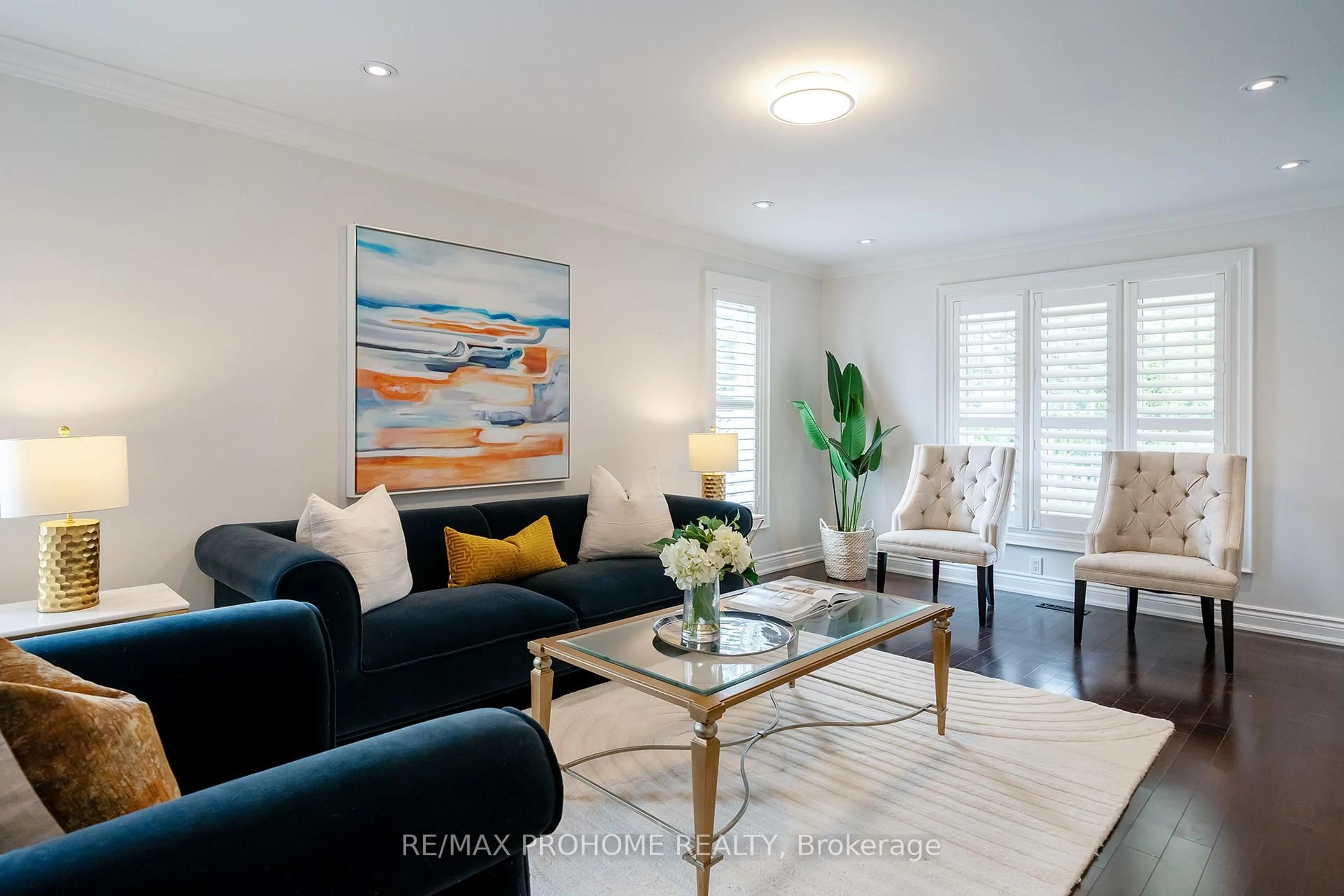 Living room with furniture, wood/laminate floor for 163 Carlton Rd, Markham Ontario L3R 3L7