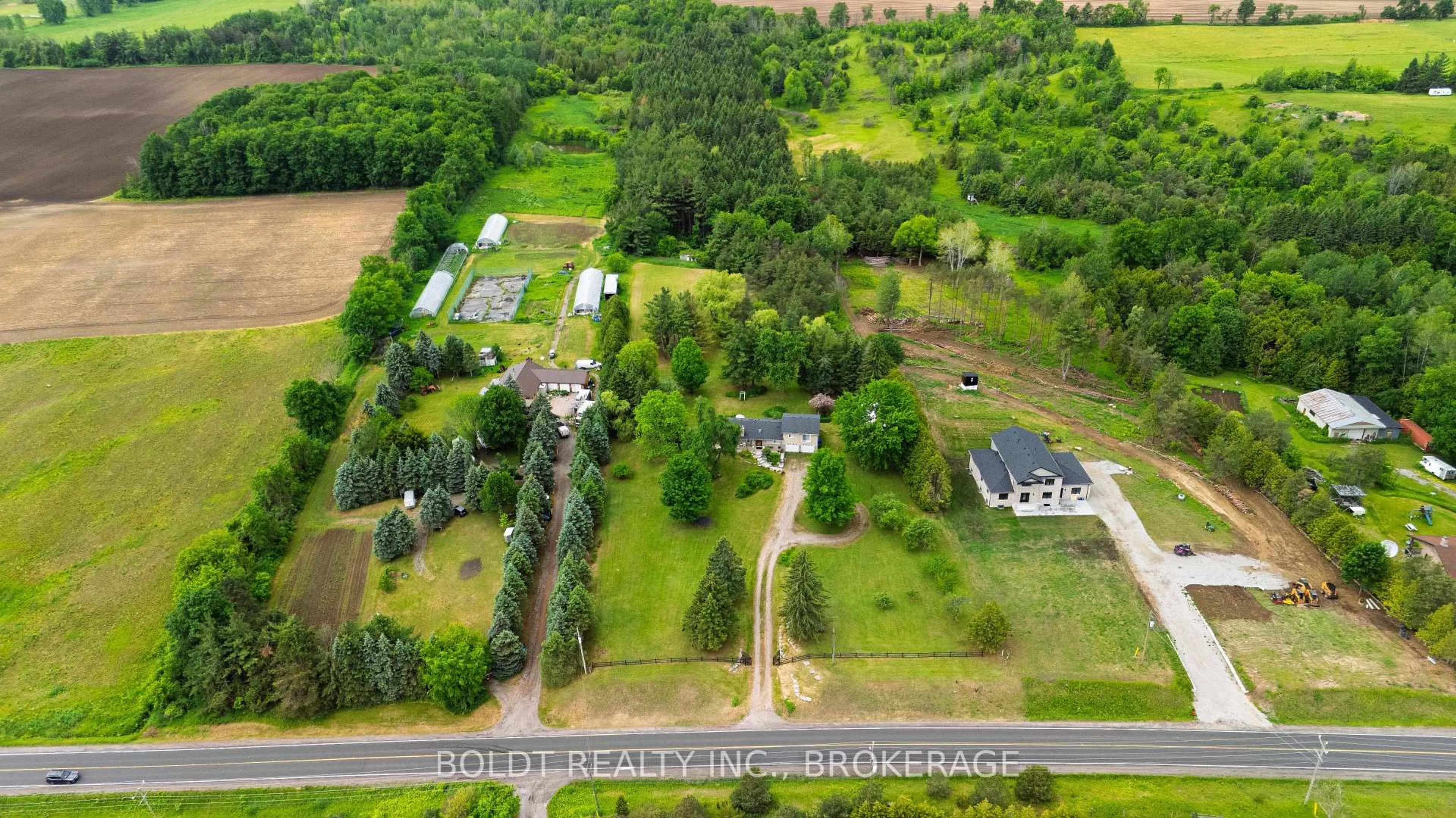 A pic from outside/outdoor area/front of a property/back of a property/a pic from drone, forest/trees view for 5832 5th Sdrd, Innisfil Ontario L0L 1L0