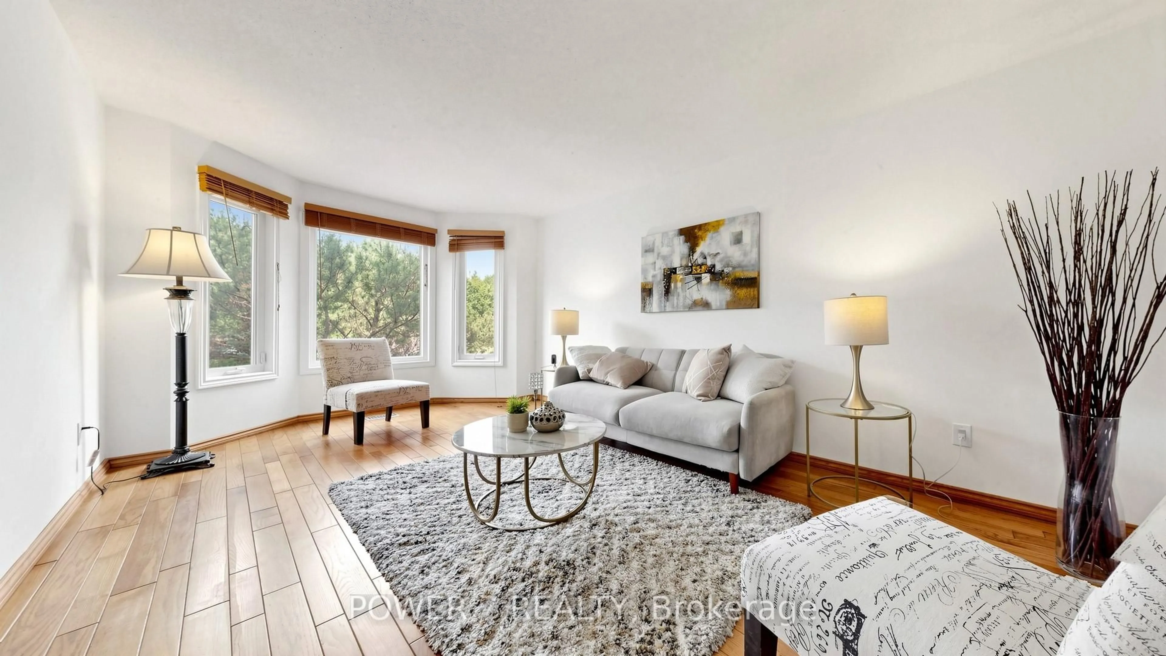 Living room with furniture, wood/laminate floor for 71 Canterbury Crt, Richmond Hill Ontario L4C 8E7
