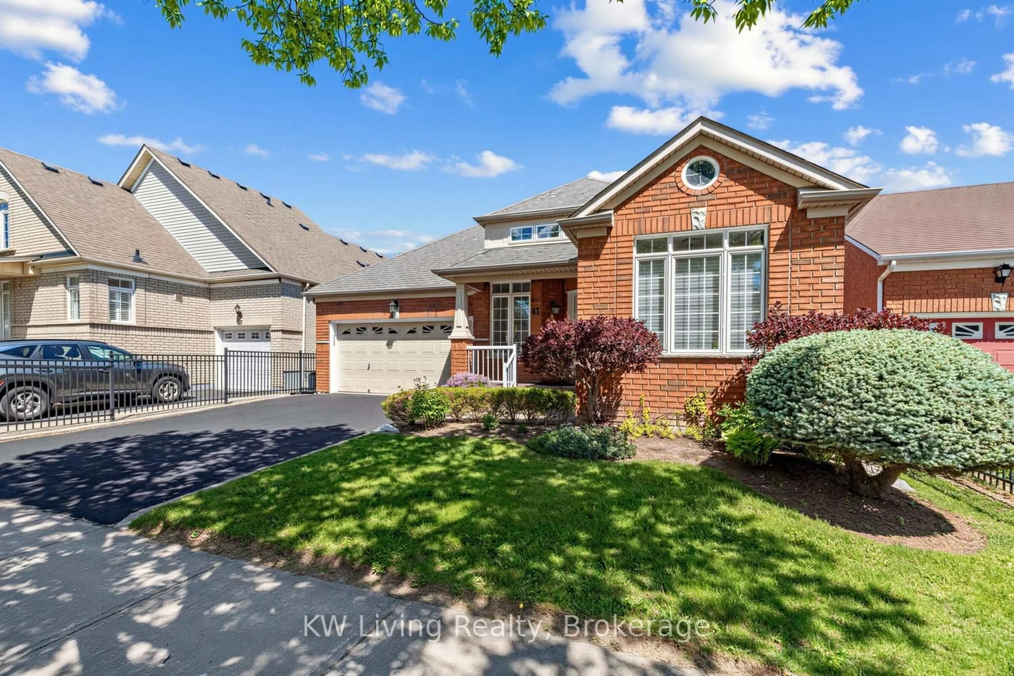 Home with brick exterior material, street for 41 Manorwood Dr, Markham Ontario L6C 2T5