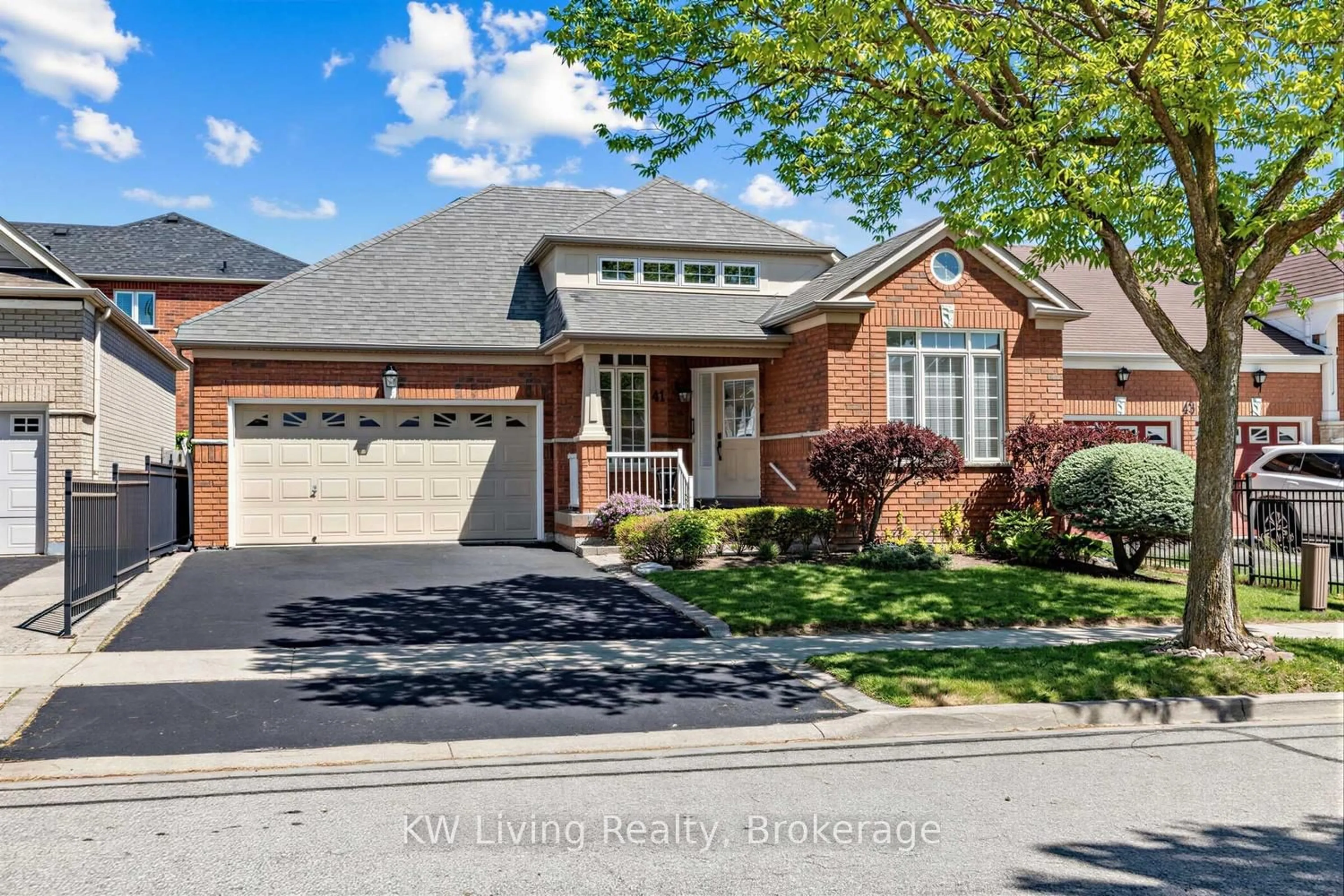 Home with brick exterior material, street for 41 Manorwood Dr, Markham Ontario L6C 2T5