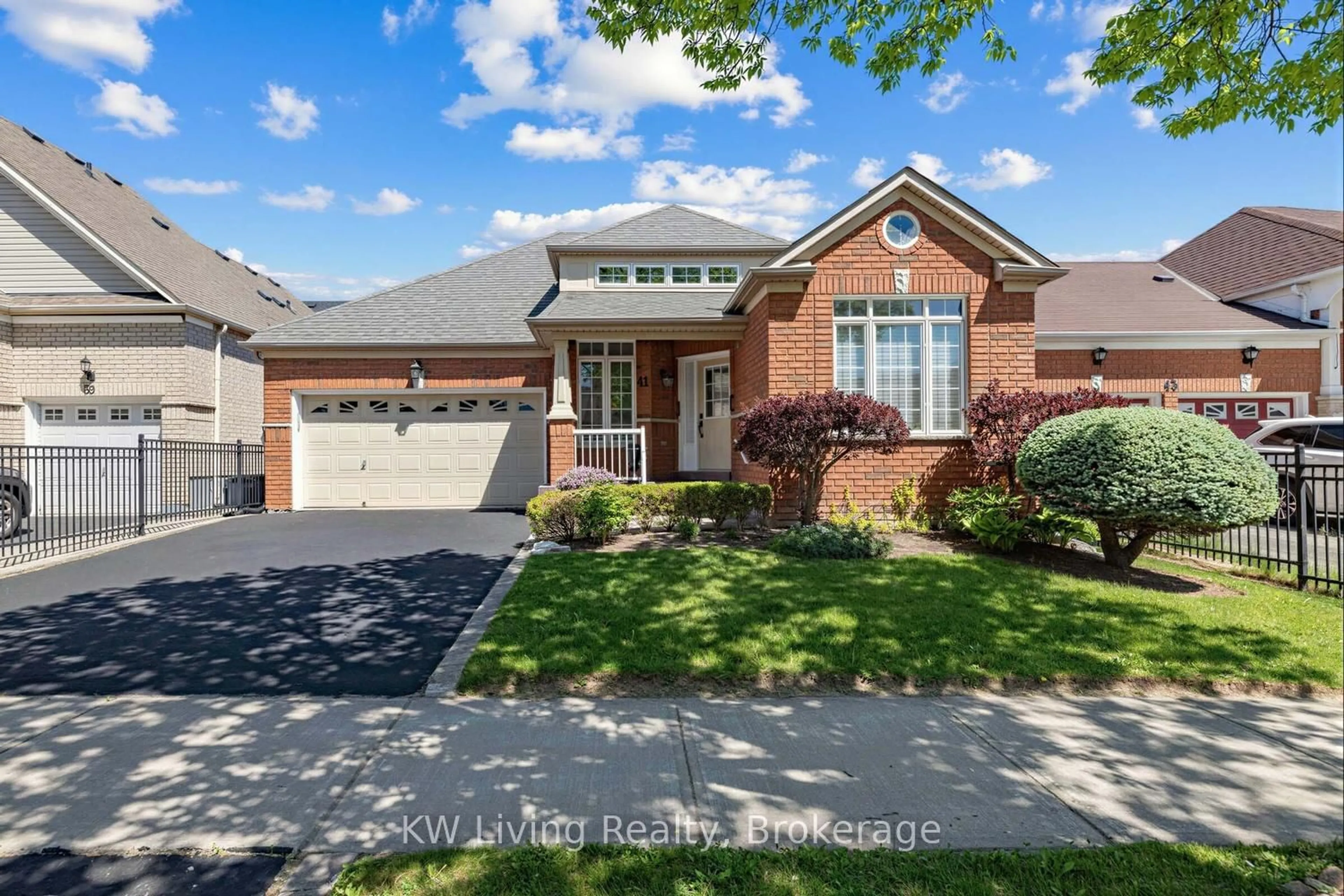 Home with brick exterior material, street for 41 Manorwood Dr, Markham Ontario L6C 2T5