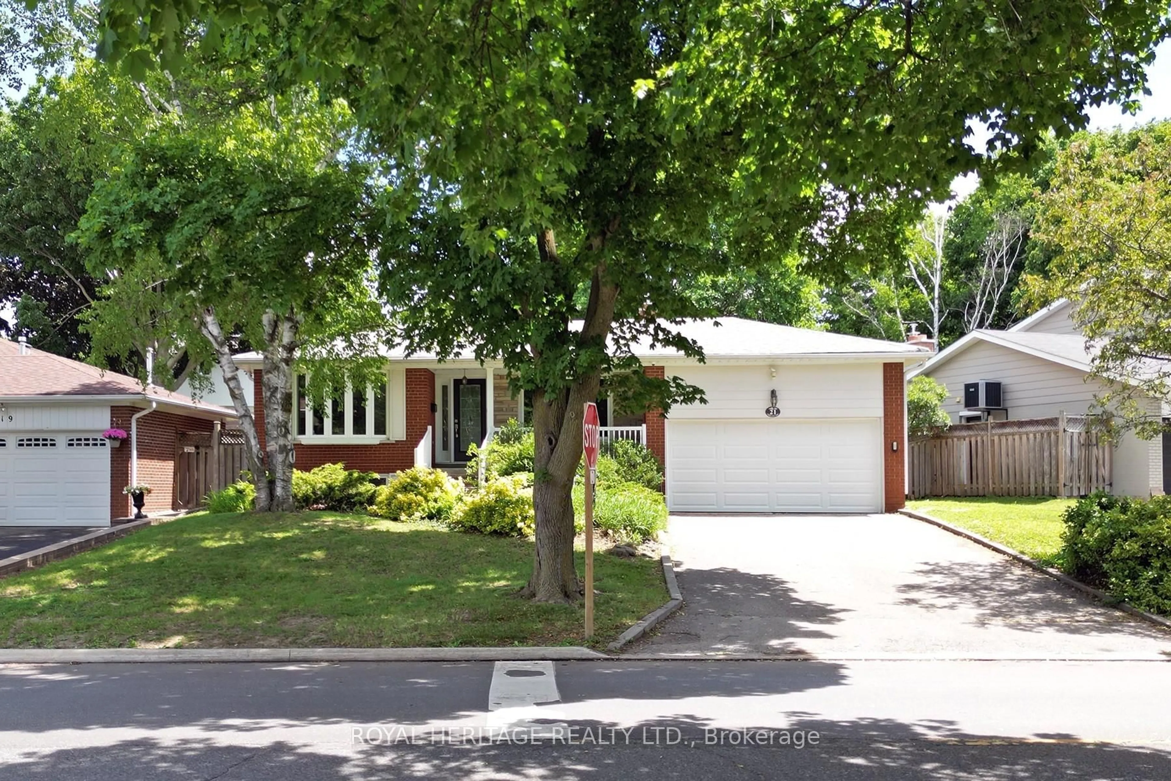 Home with brick exterior material, street for 21 Wootten Way, Markham Ontario L3P 3H9