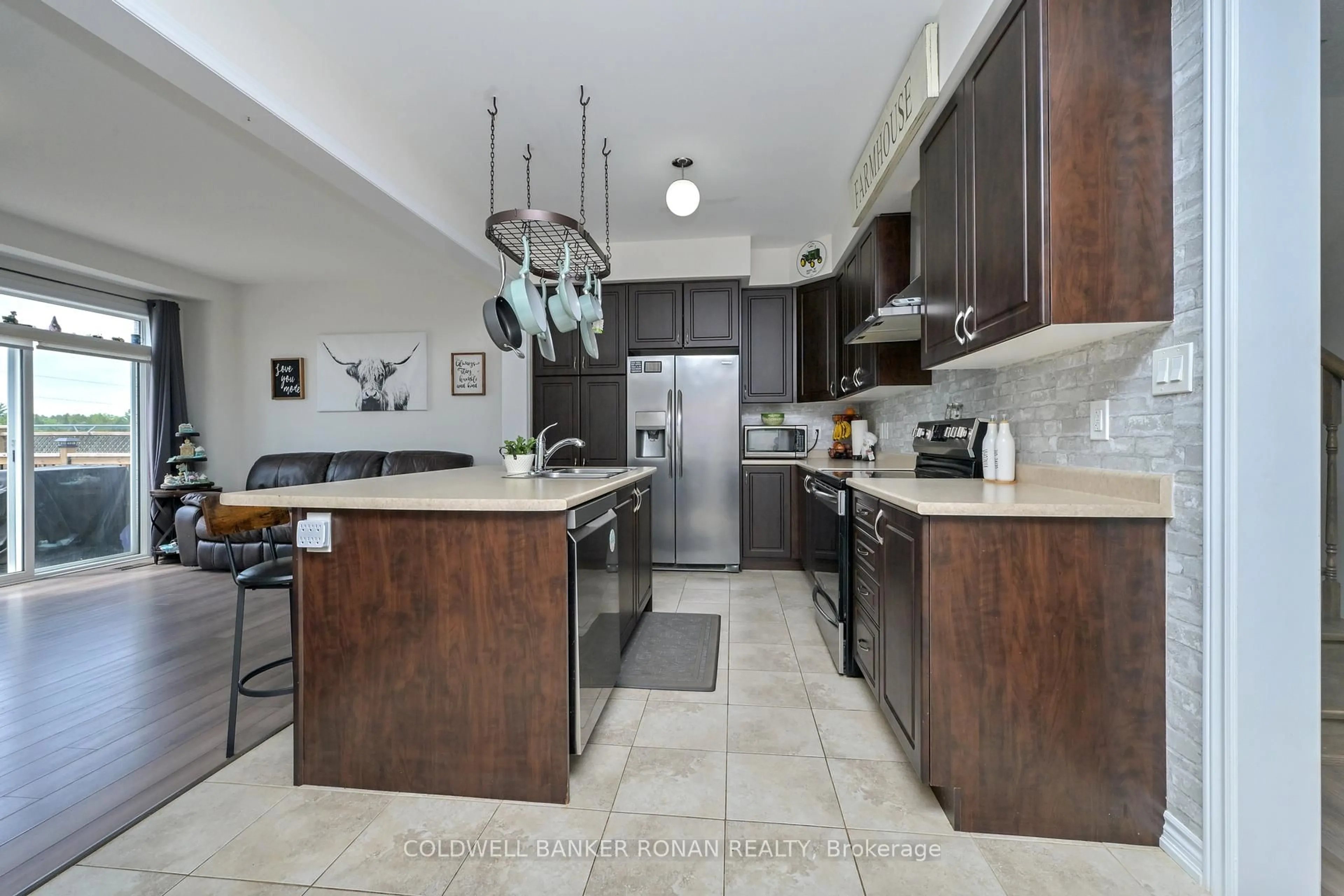 Open concept kitchen, ceramic/tile floor for 73 Wagner Cres, Essa Ontario L0M 1B6
