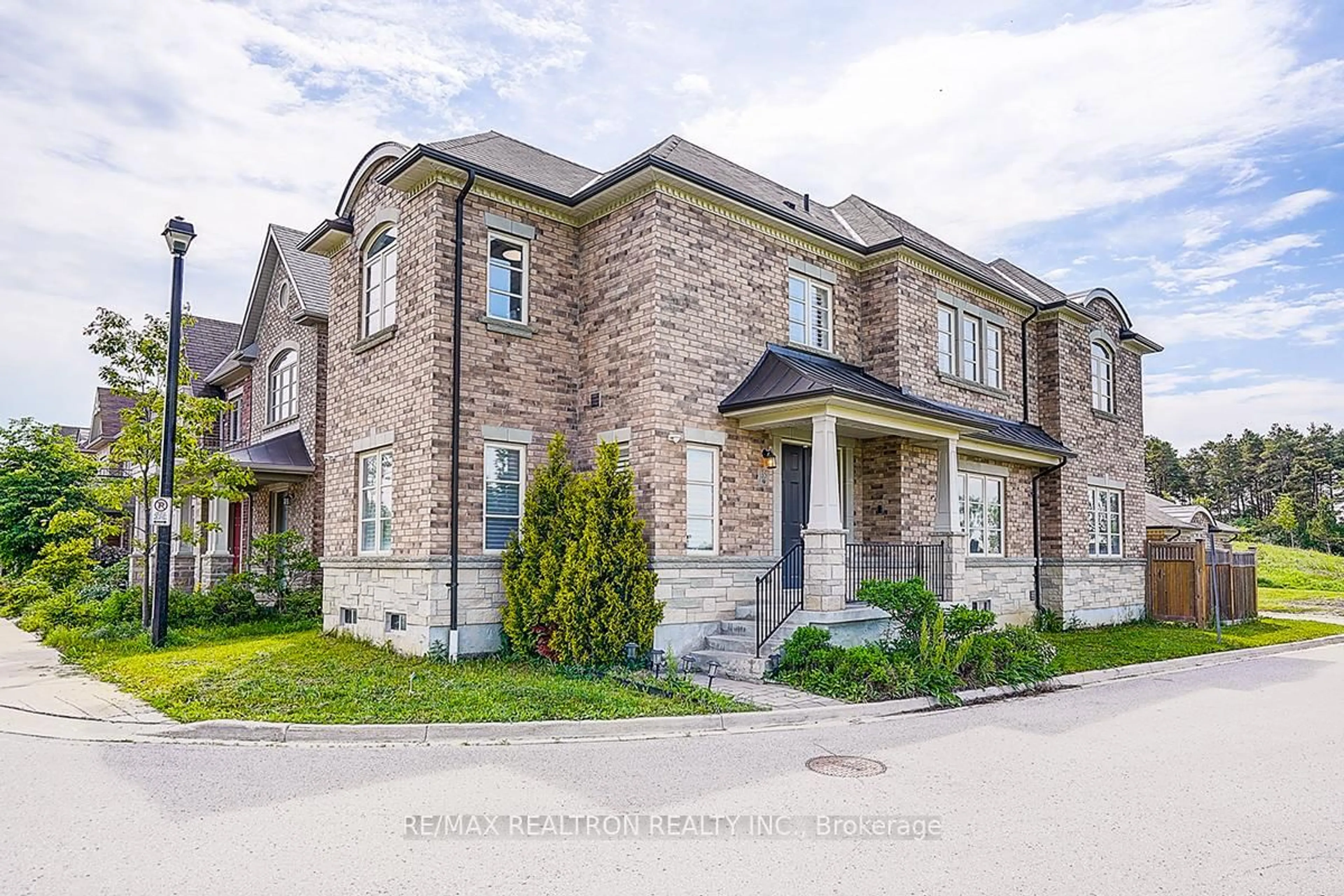 Home with brick exterior material, street for 35 Calamint Lane, Richmond Hill Ontario L4E 1C3