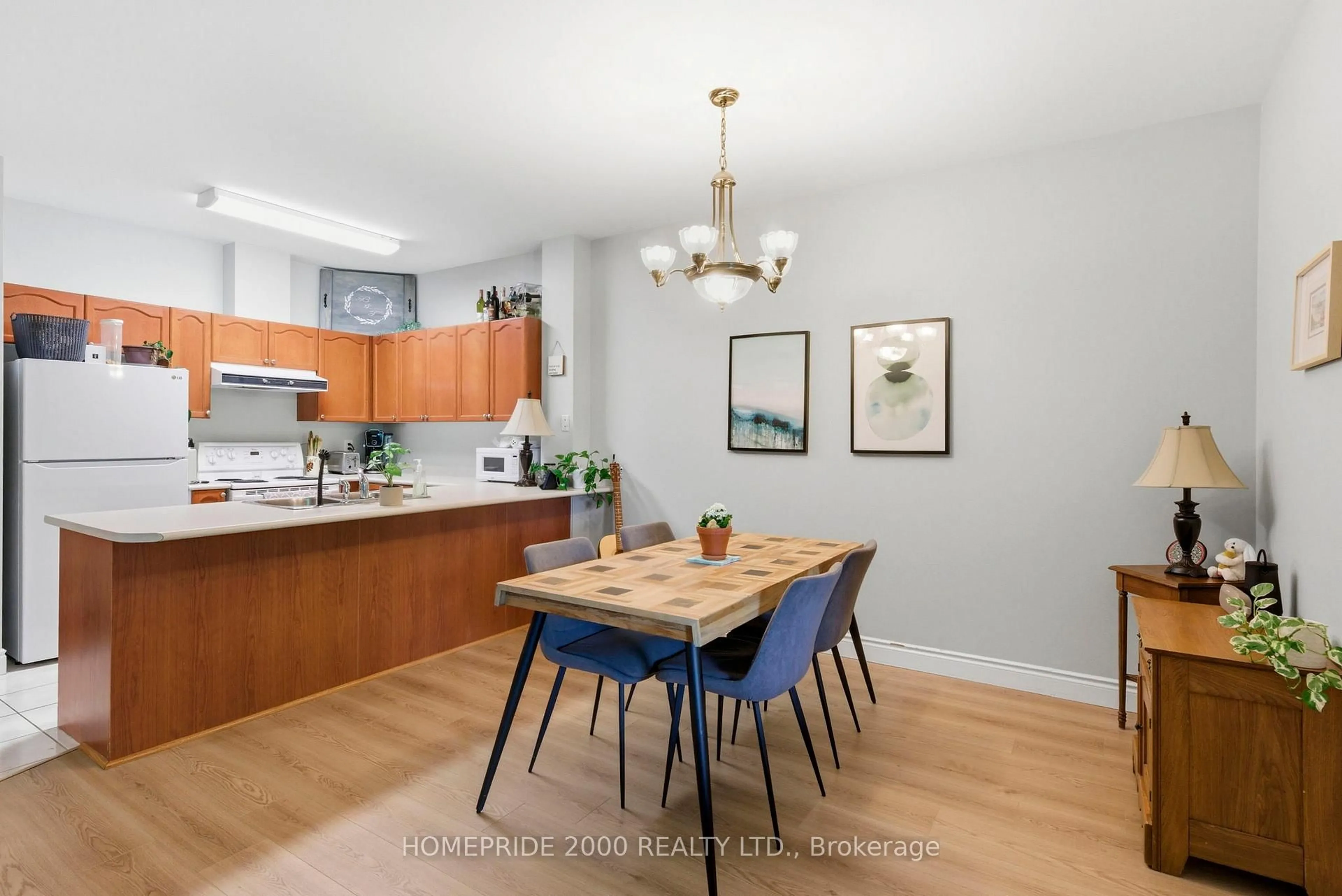Open concept kitchen, wood/laminate floor for 33 Wallace St #203, Vaughan Ontario L4L 2P2