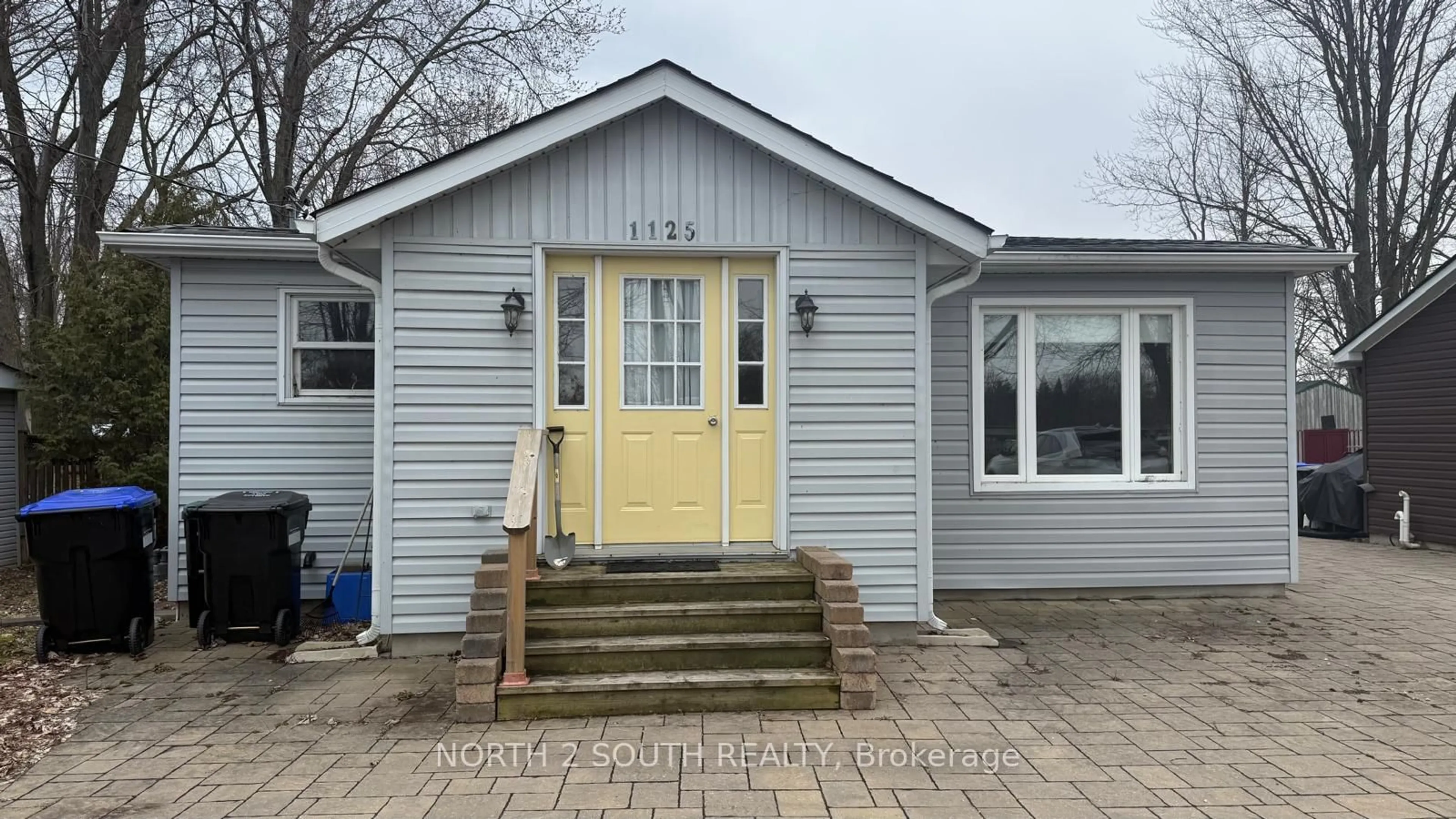 Home with vinyl exterior material, street for 1125 Shore Acres Dr, Innisfil Ontario L0L 1R0