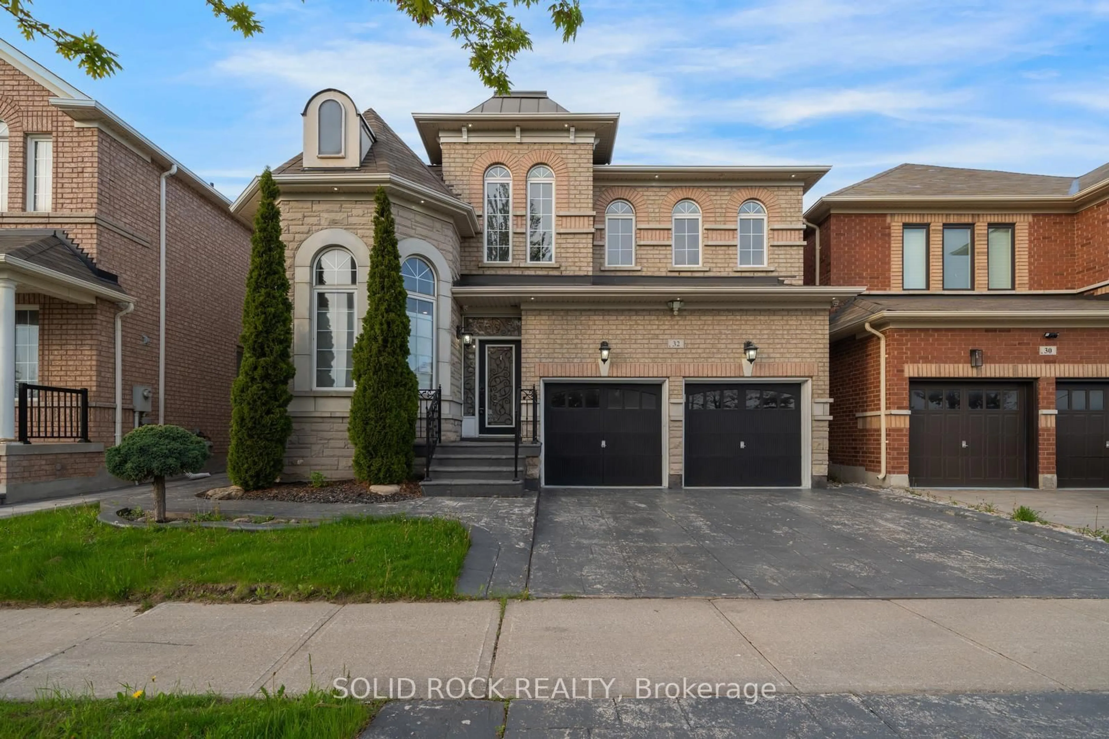 Home with brick exterior material, street for 32 Albert Roffey Cres, Markham Ontario L6B 0H1