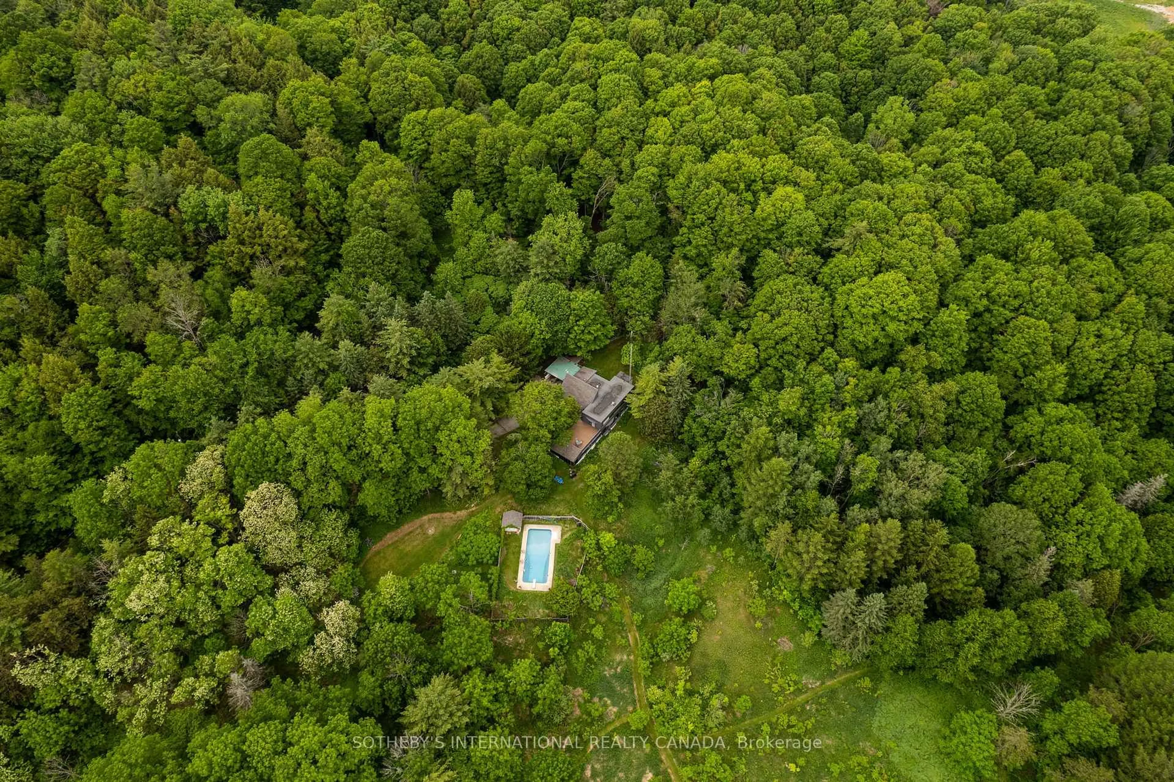 A pic from outside/outdoor area/front of a property/back of a property/a pic from drone, forest/trees view for 14645 7th Concession, King Ontario L7B 1K4