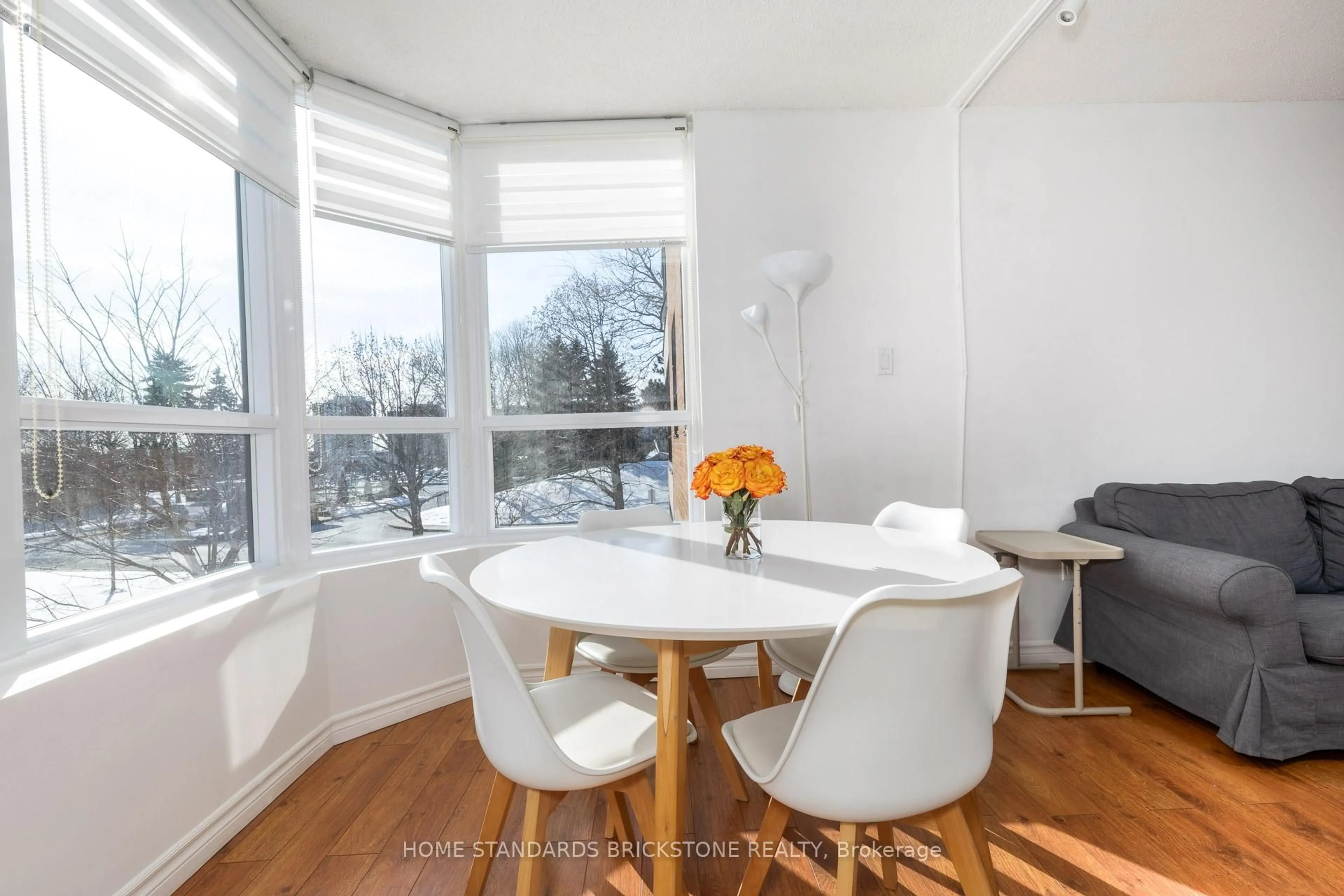 Dining room, wood/laminate floor for 7601 Bathurst St #205, Vaughan Ontario L4J 4H5