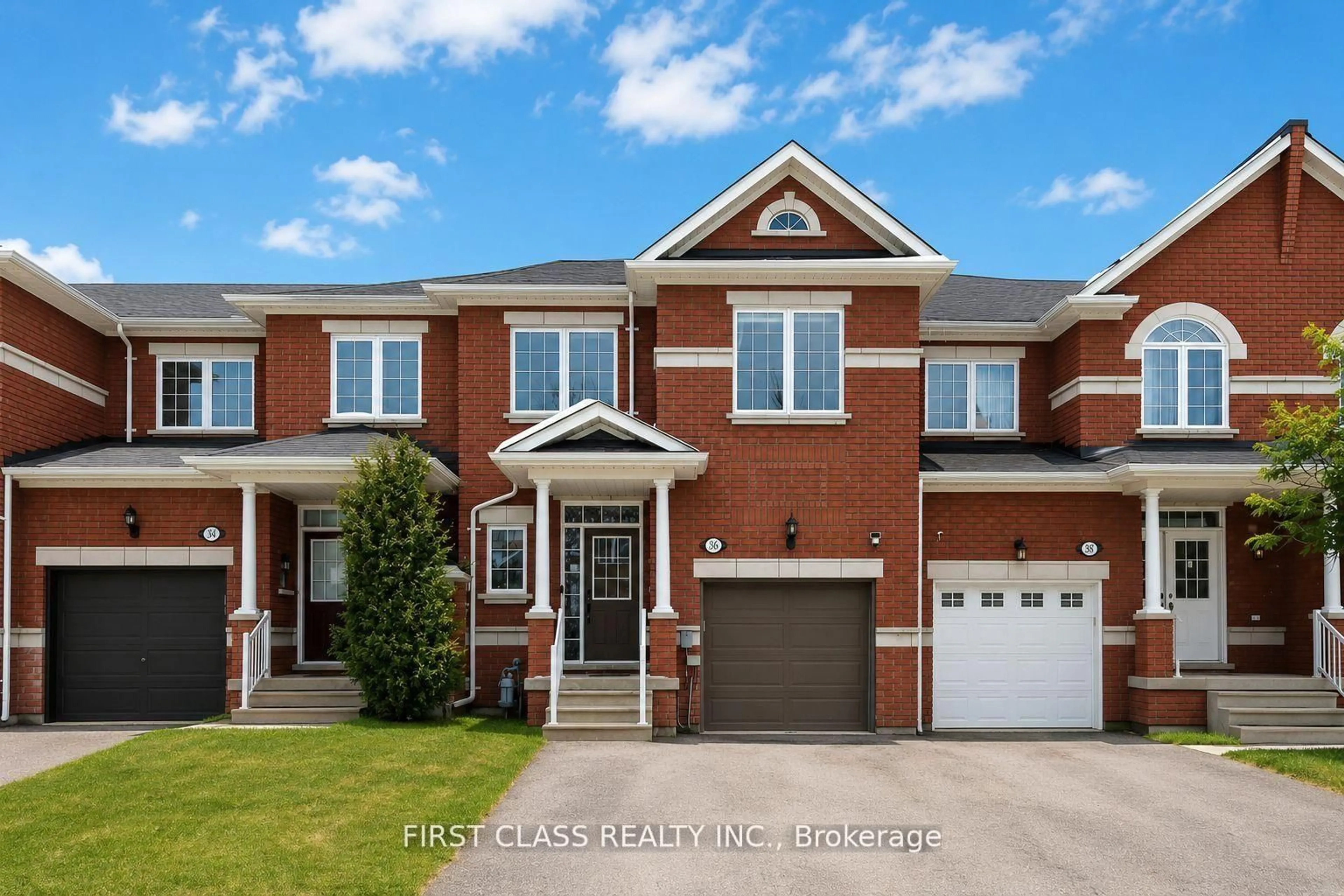 Home with brick exterior material, street for 8 Townwood Dr #36, Richmond Hill Ontario L4E 4Y3