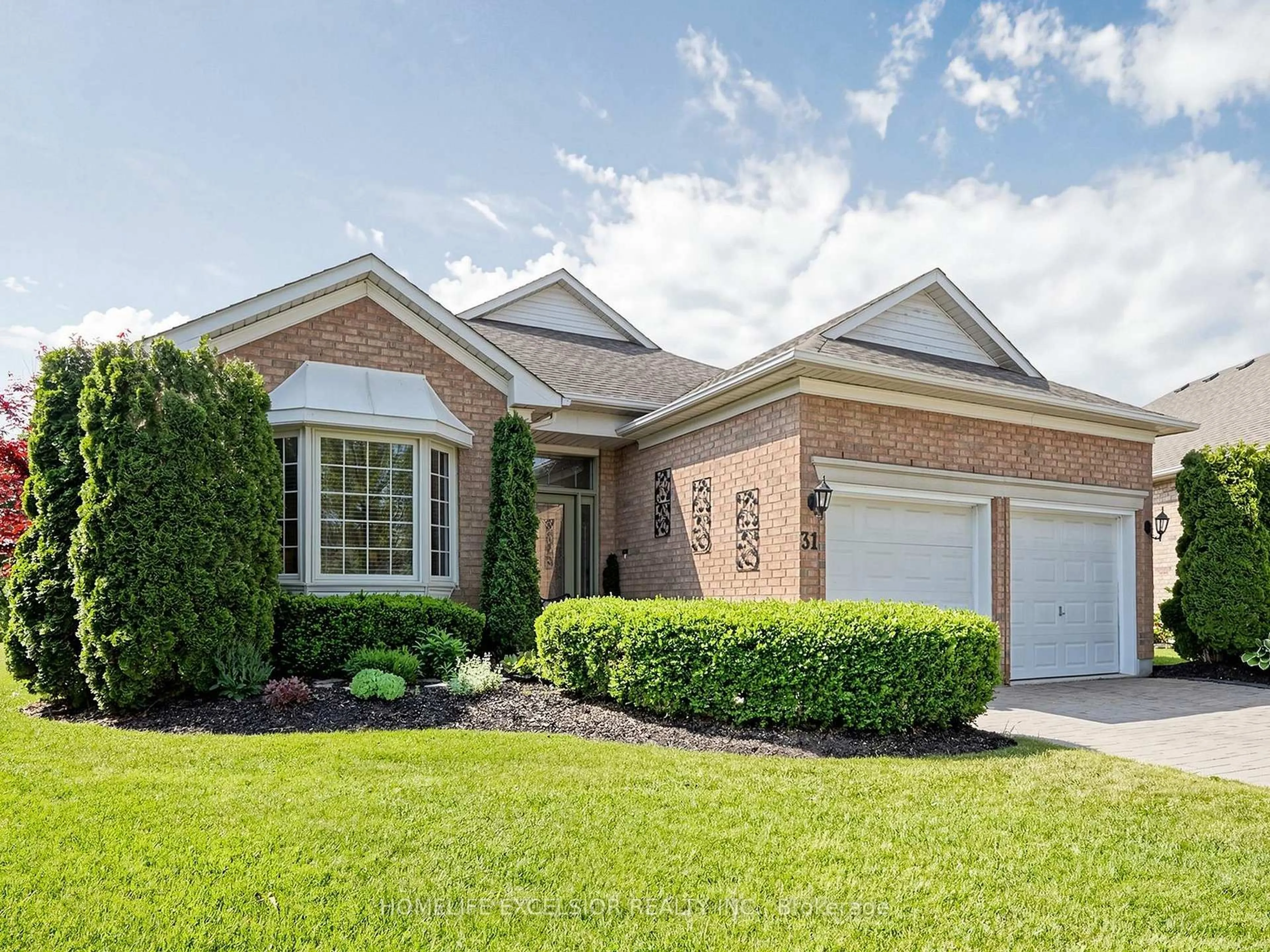 Home with brick exterior material, street for 31 Sneads Green #77, Whitchurch-Stouffville Ontario L4A 1M3