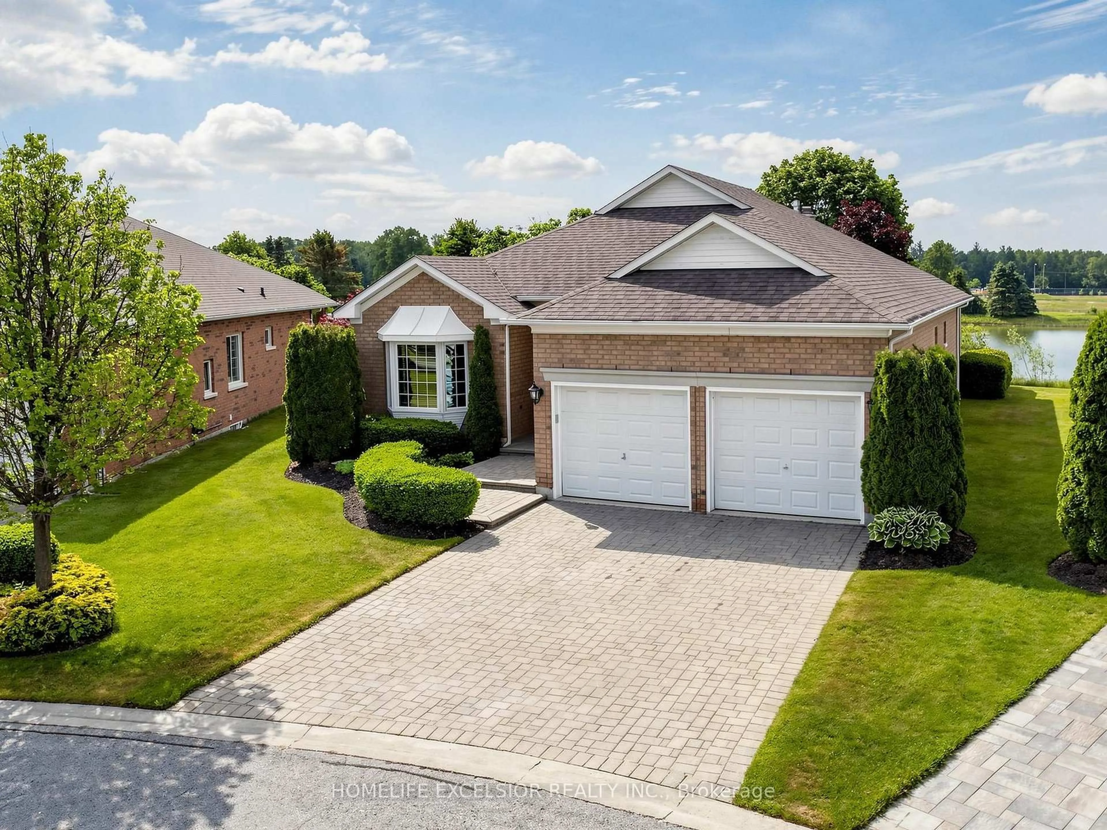 Home with brick exterior material, street for 31 Sneads Green #77, Whitchurch-Stouffville Ontario L4A 1M3