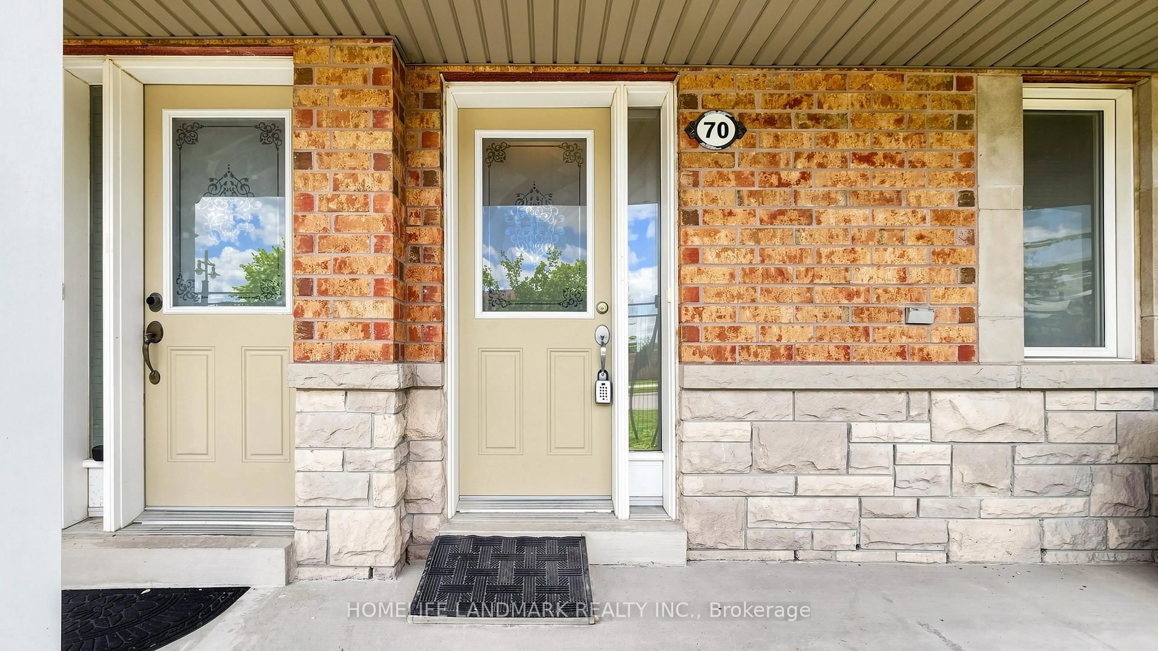 Home with brick exterior material, street for 70 Sanctuary Way, Markham Ontario L6E 0C2