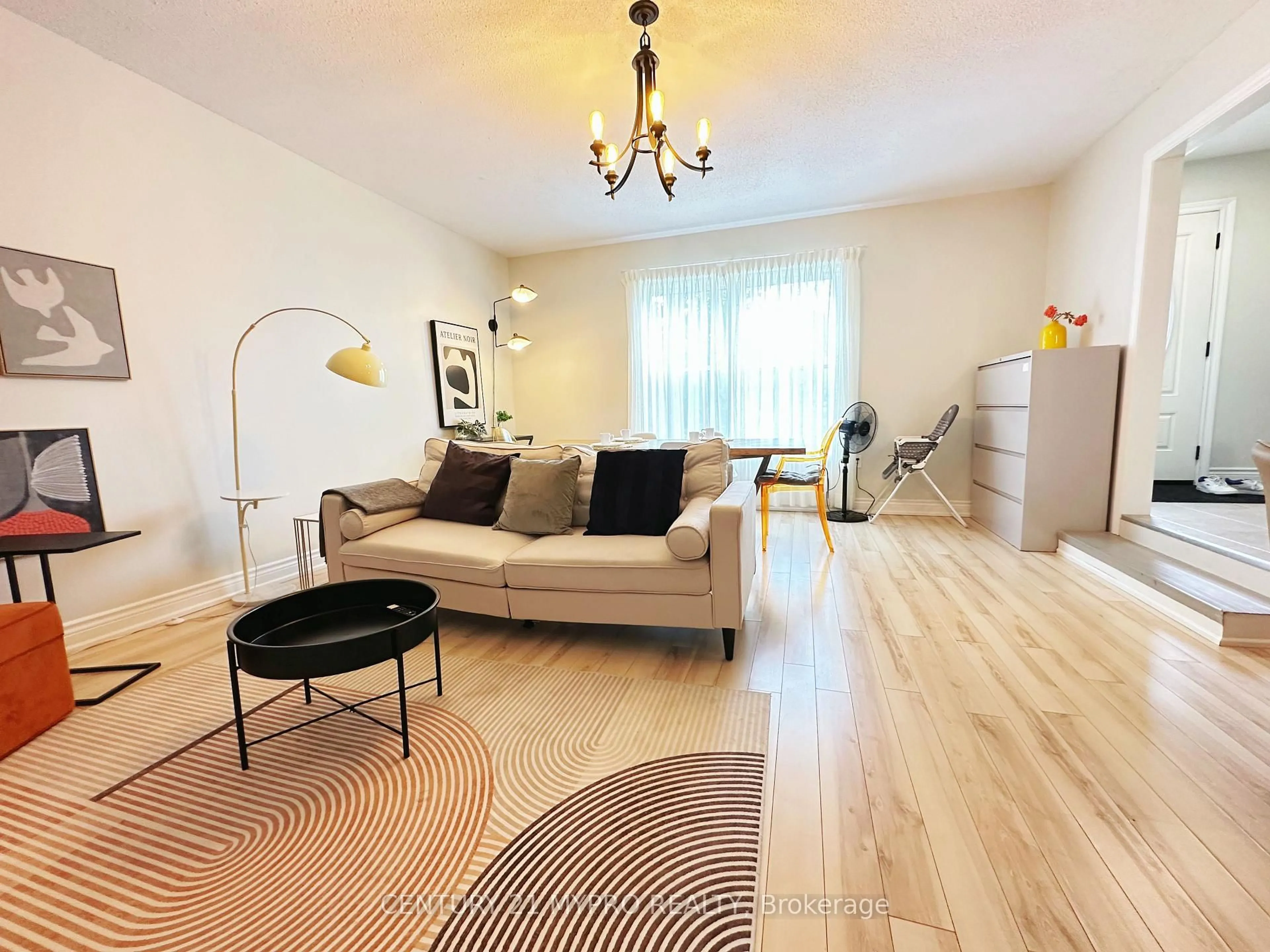 Living room with furniture, wood/laminate floor for 94 Prospect St, Newmarket Ontario L3Y 3T4
