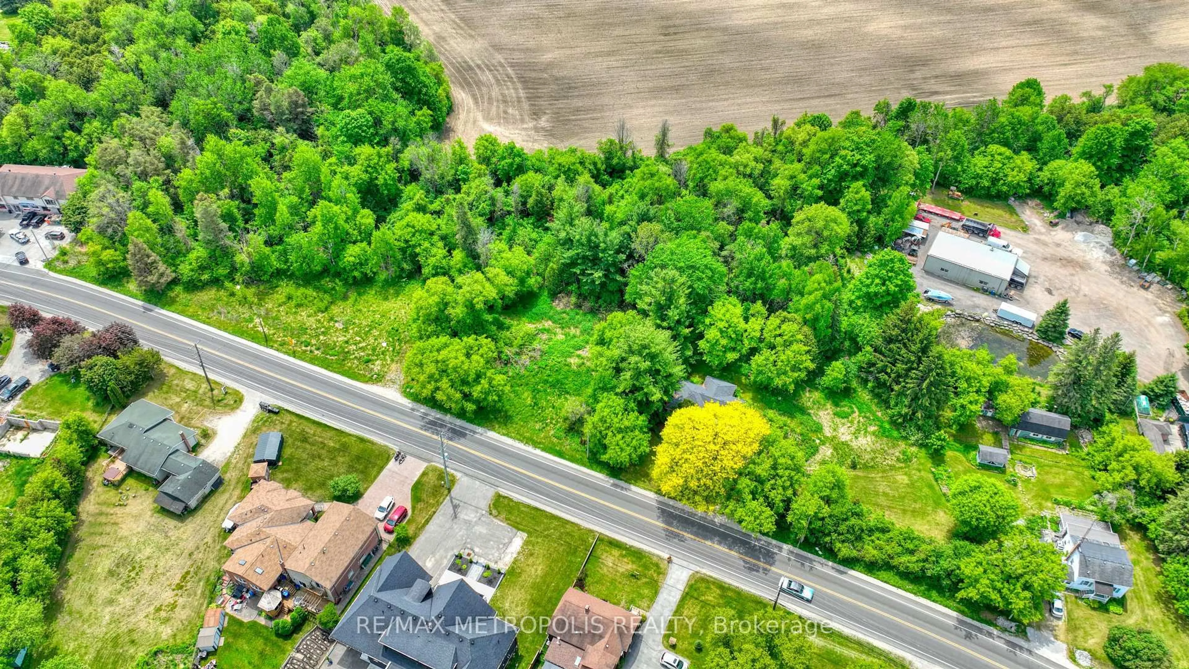 A pic from outside/outdoor area/front of a property/back of a property/a pic from drone, street for 4605 Lloydtown Aurora Rd, King Ontario L7B 0E3